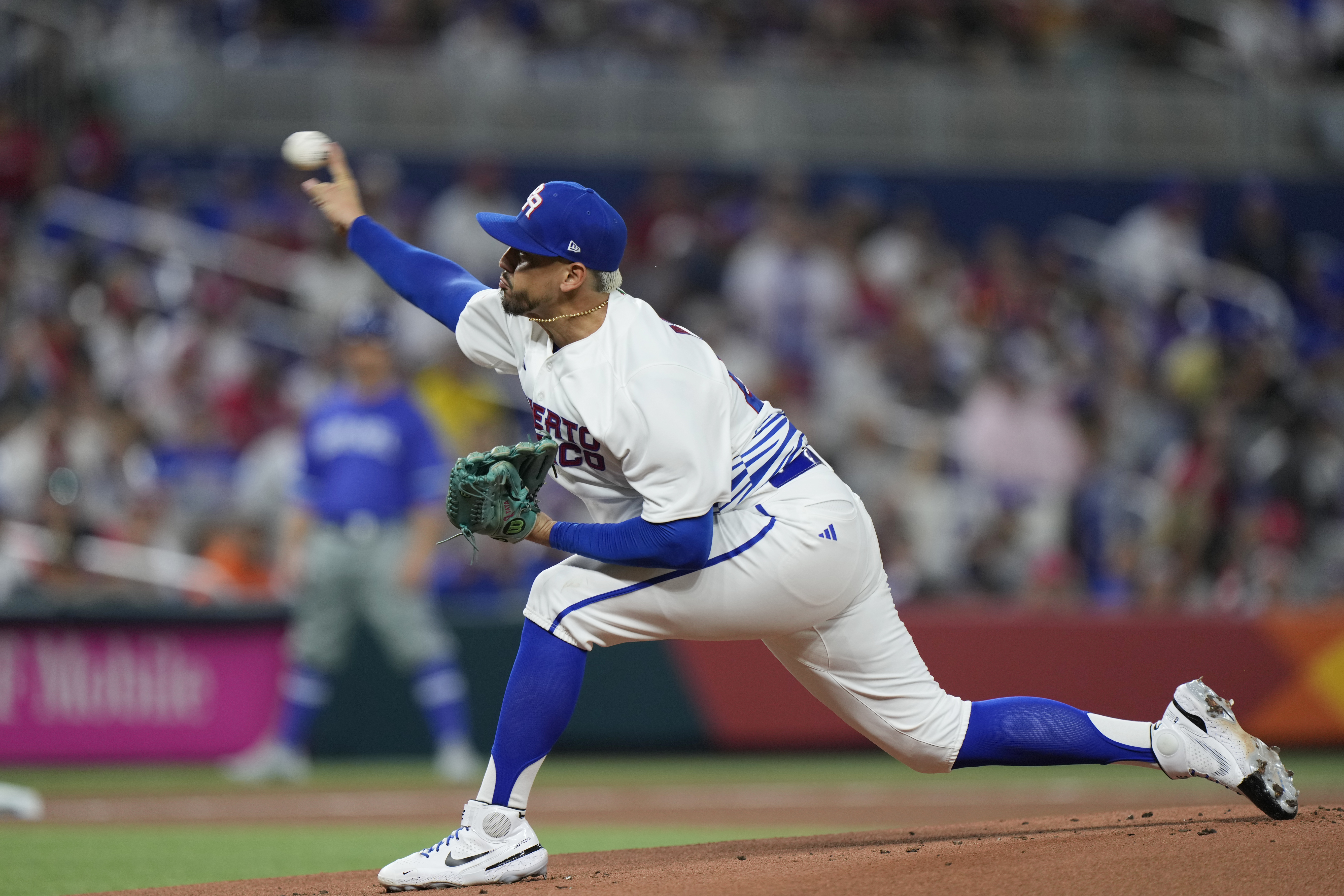 Puerto Rico's Jose De Leon delivers a pitch during the first inning of a World Baseball Classic game against Israel, Monday, March 13, 2023, in Miami. 