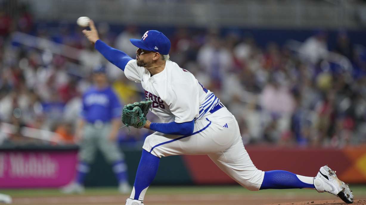 Puerto Rico's Jose De Leon delivers a pitch during the first inning of a World Baseball Classic game against Israel, Monday, March 13, 2023, in Miami.