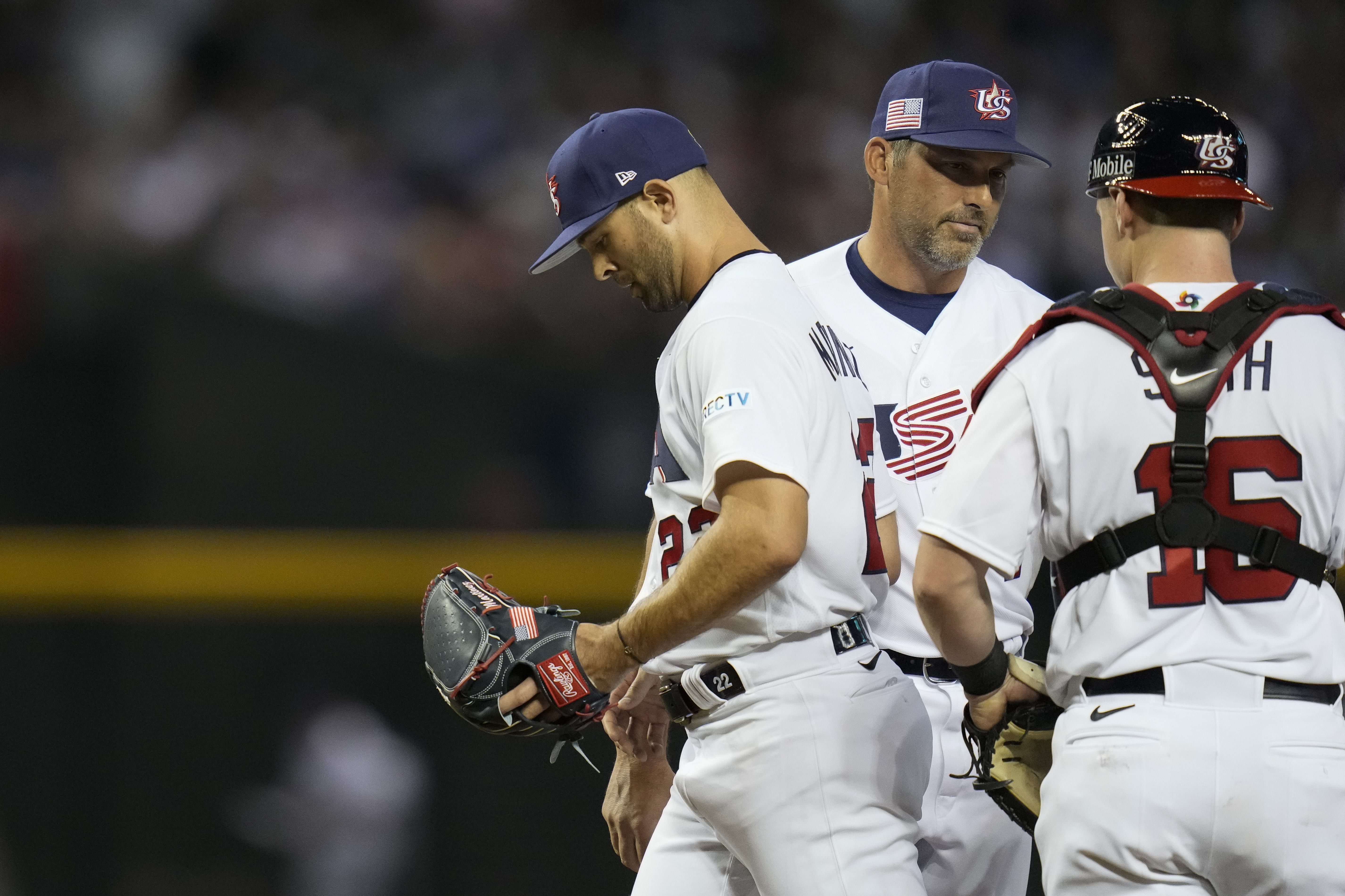 United States pitcher Nick Martinez, left, exits during the third inning of a World Baseball Classic game against Mexico in Phoenix, Sunday, March 12, 2023. 