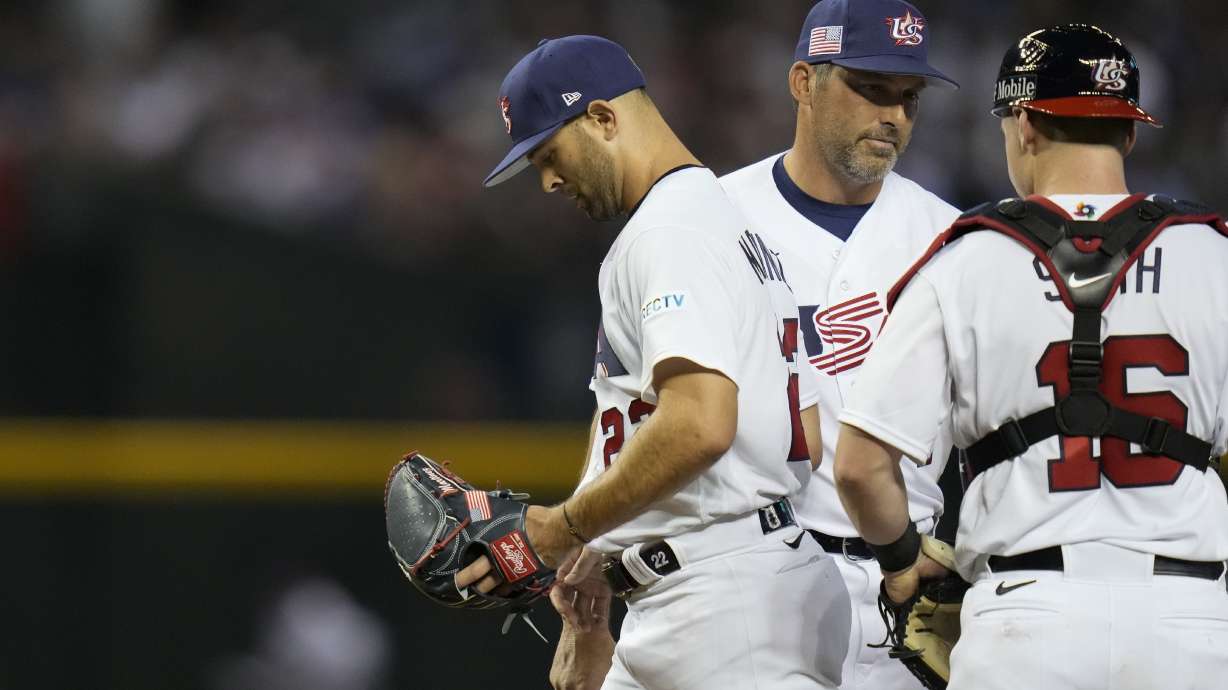 United States pitcher Nick Martinez, left, exits during the third inning of a World Baseball Classic game against Mexico in Phoenix, Sunday, March 12, 2023.