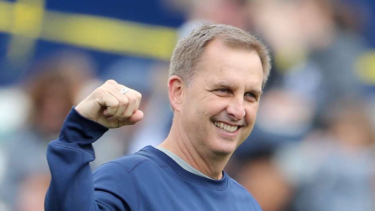 Brigham Young Cougars offensive coordinator Ty Detmer watches warmups before a spring football scrimmage at LaVell Edwards Stadium in Provo, on March 26, 2016.