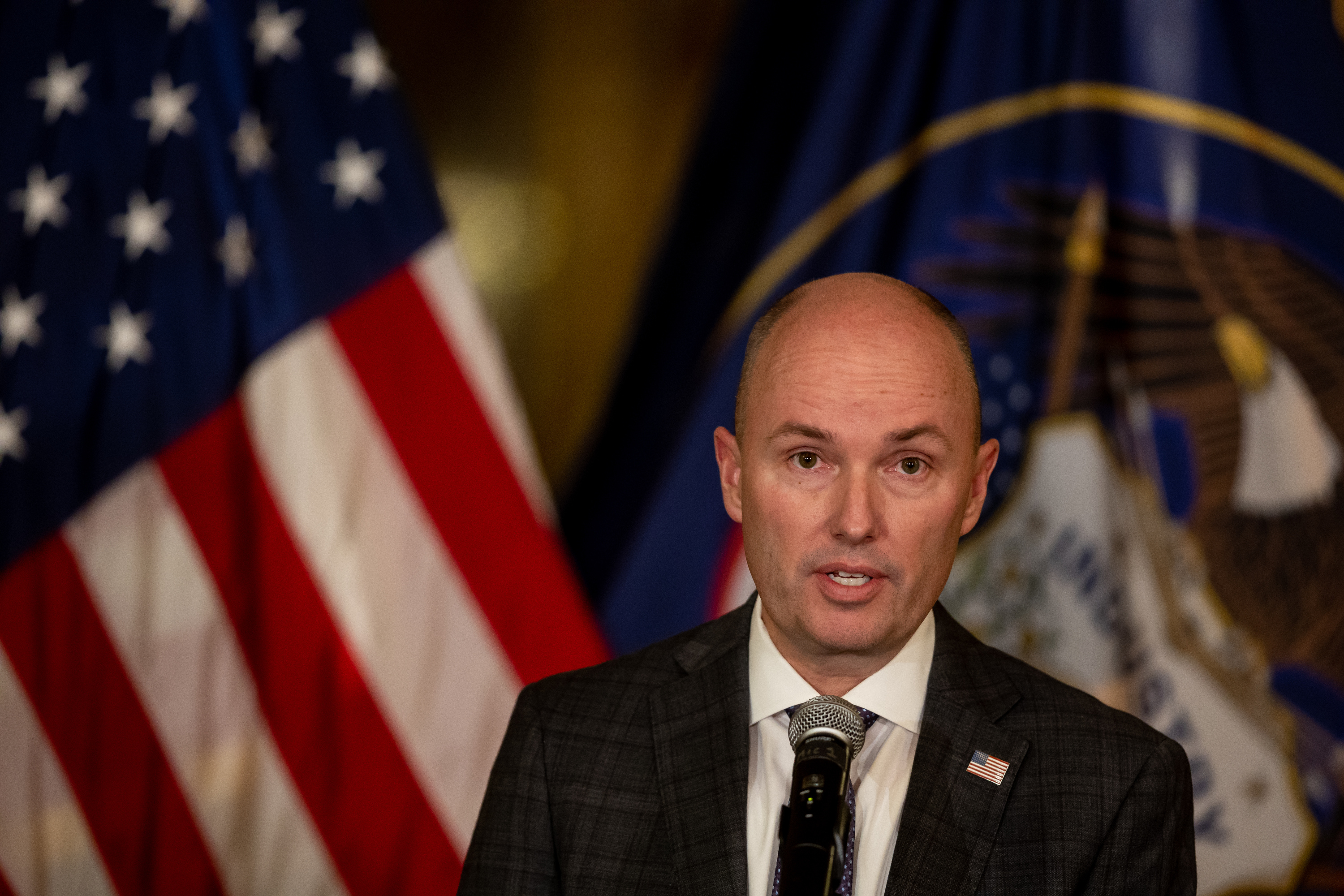 Gov. Spencer Cox talks to reporters at the Capitol in Salt Lake City on March 3. Immigration advocates are urging Cox to veto HB209, which they say would exclude immigrant youth from extracurricular activities.
