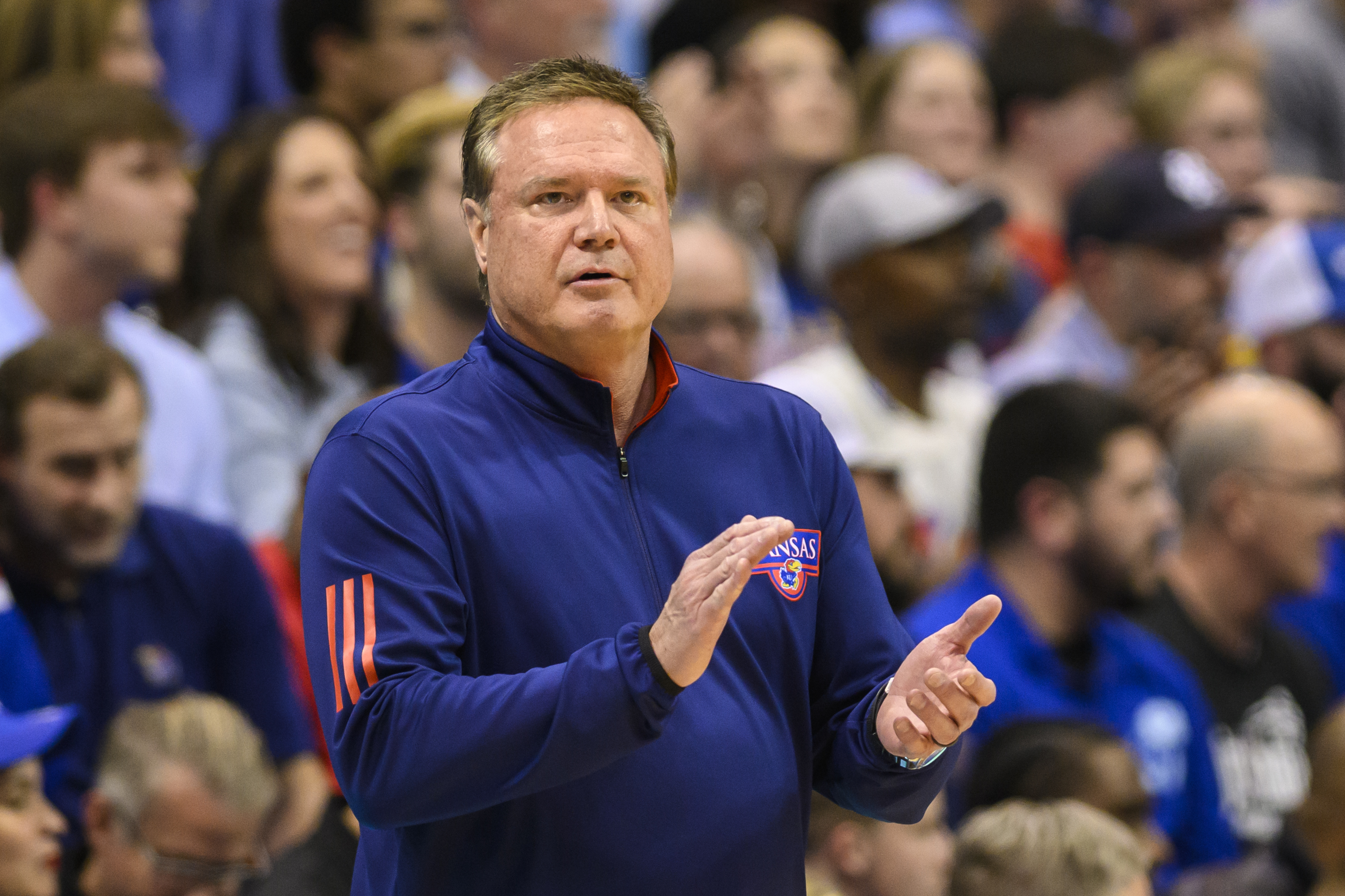 Kansas head coach Bill Self applauds his team's play against Texas Tech during the first half of an NCAA college basketball game in Lawrence, Kan., Tuesday, Feb. 28, 2023. 