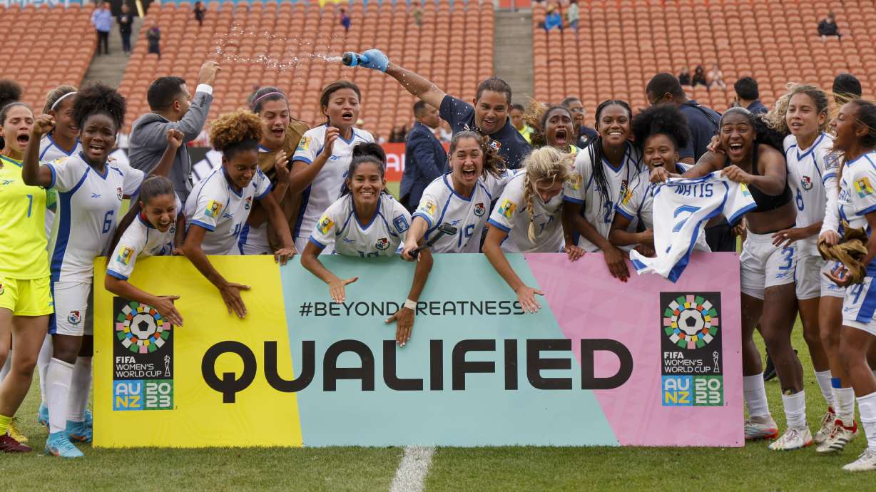 Panama players celebrate after defeating Paraguay in their FIFA women's World Cup qualifier in Hamilton, New Zealand, Thursday, Feb. 23, 2023.