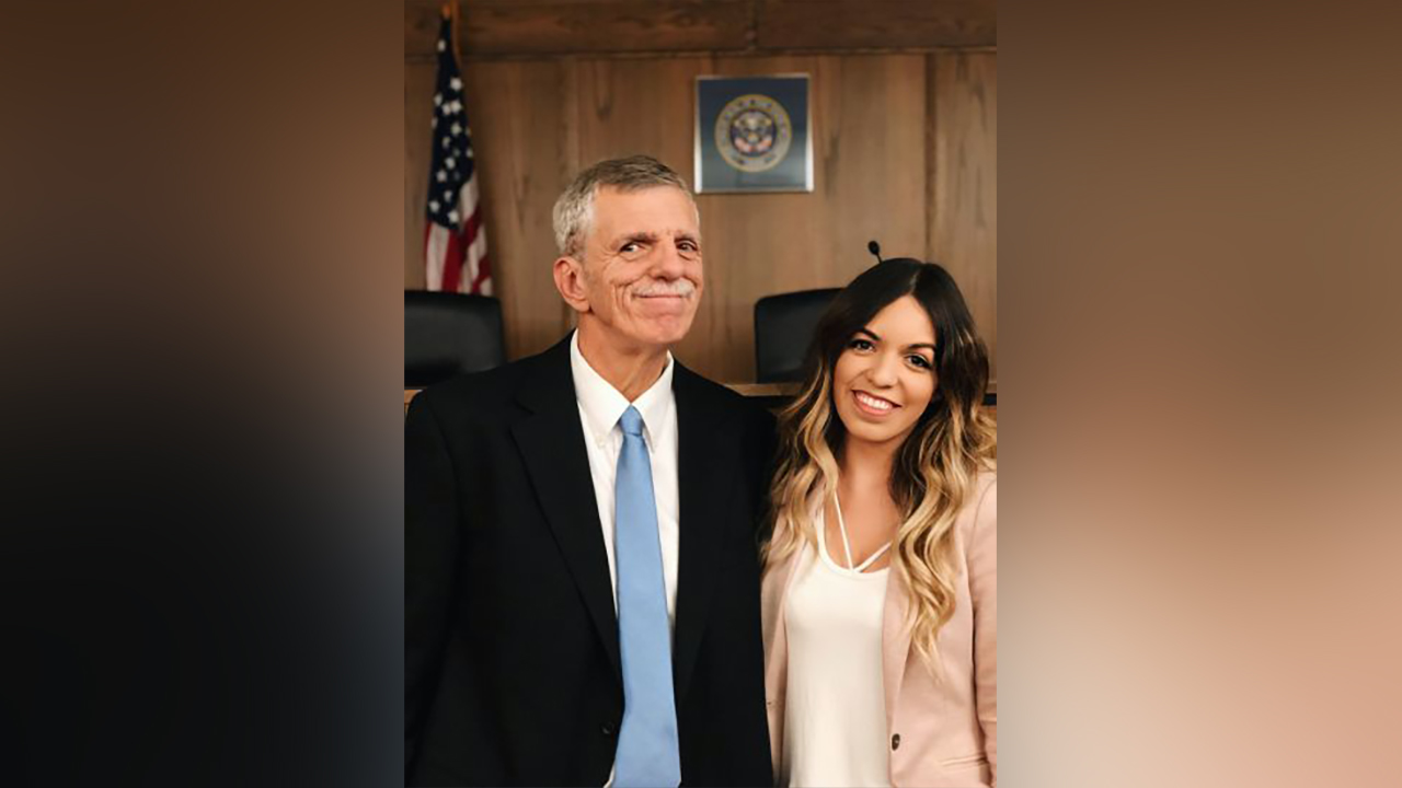 Bryon Saxton, who served on the Roy City Council, poses with his daughter, Julia Saxton.