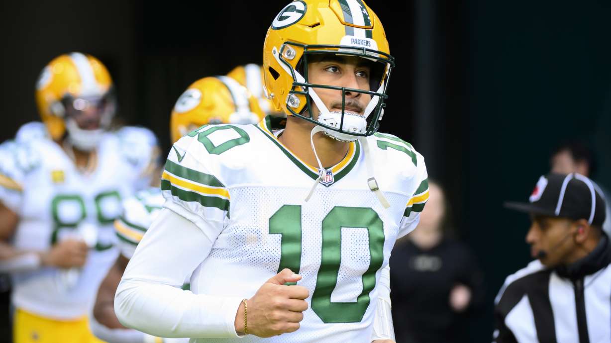 Green Bay Packers quarterback Jordan Love (10) runs onto the field before an NFL football game against the Miami Dolphins, Sunday, Dec. 25, 2022, in Miami Gardens, Fla. With Aaron Rodgers signing to play for the New York Jets in the upcoming season, Love finally gets his chance to take over as a starting quarterback in his fourth NFL season.