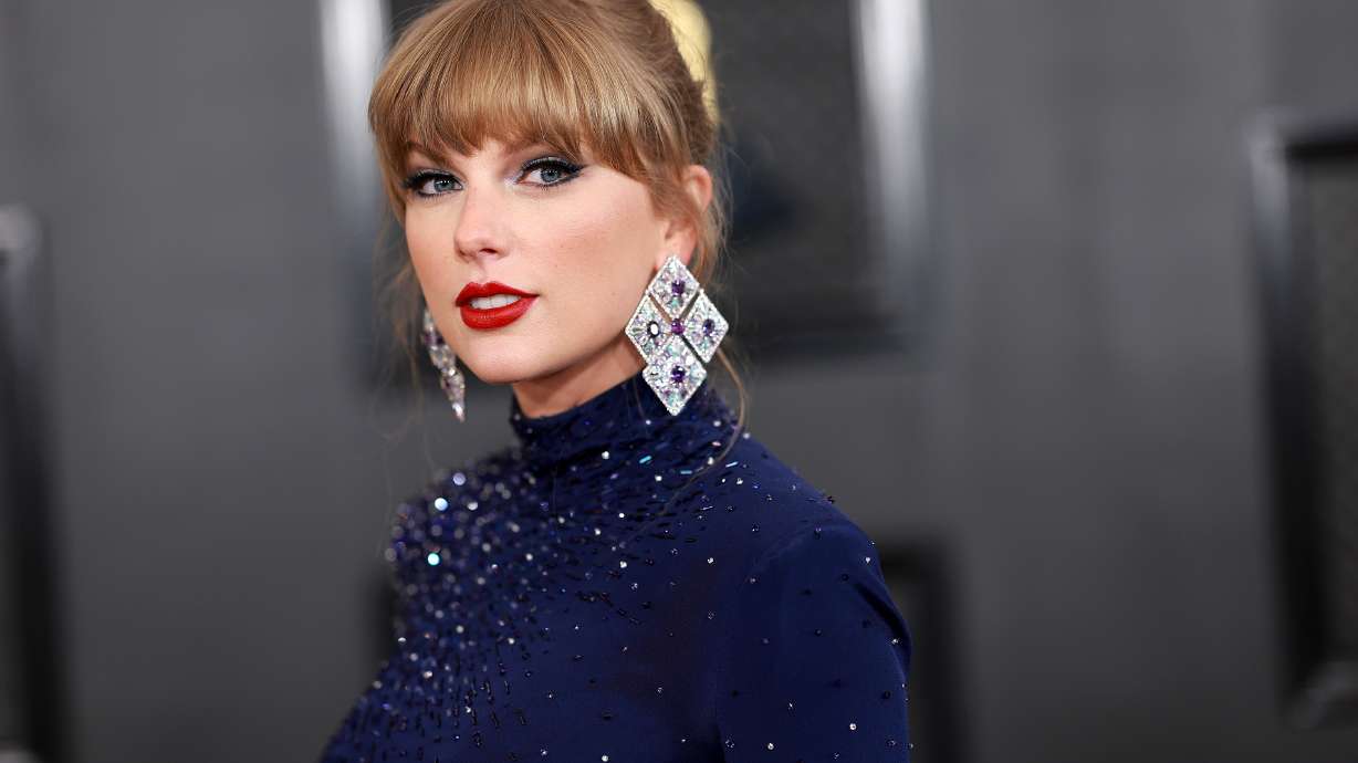 Taylor Swift, seen here attending the 65th GRAMMY Awards on Feb. 5 in Los Angeles, is set to unveil four previously unreleased songs in celebration of her tour.