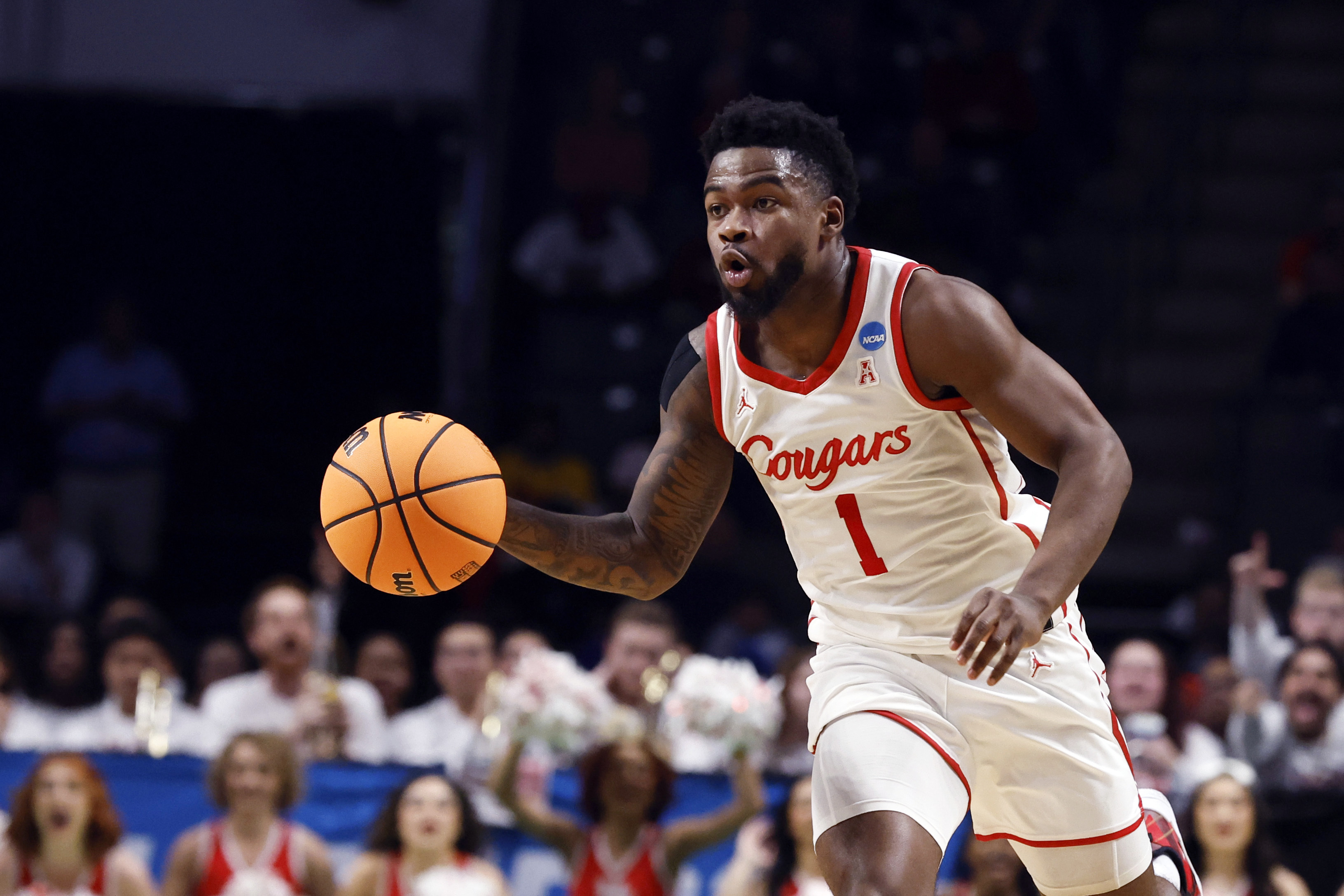 Houston guard Jamal Shead brings the ball up during the first half of the team's first-round college basketball game against Northern Kentucky in the men's NCAA Tournament in Birmingham, Ala., Thursday, March 16, 2023.
