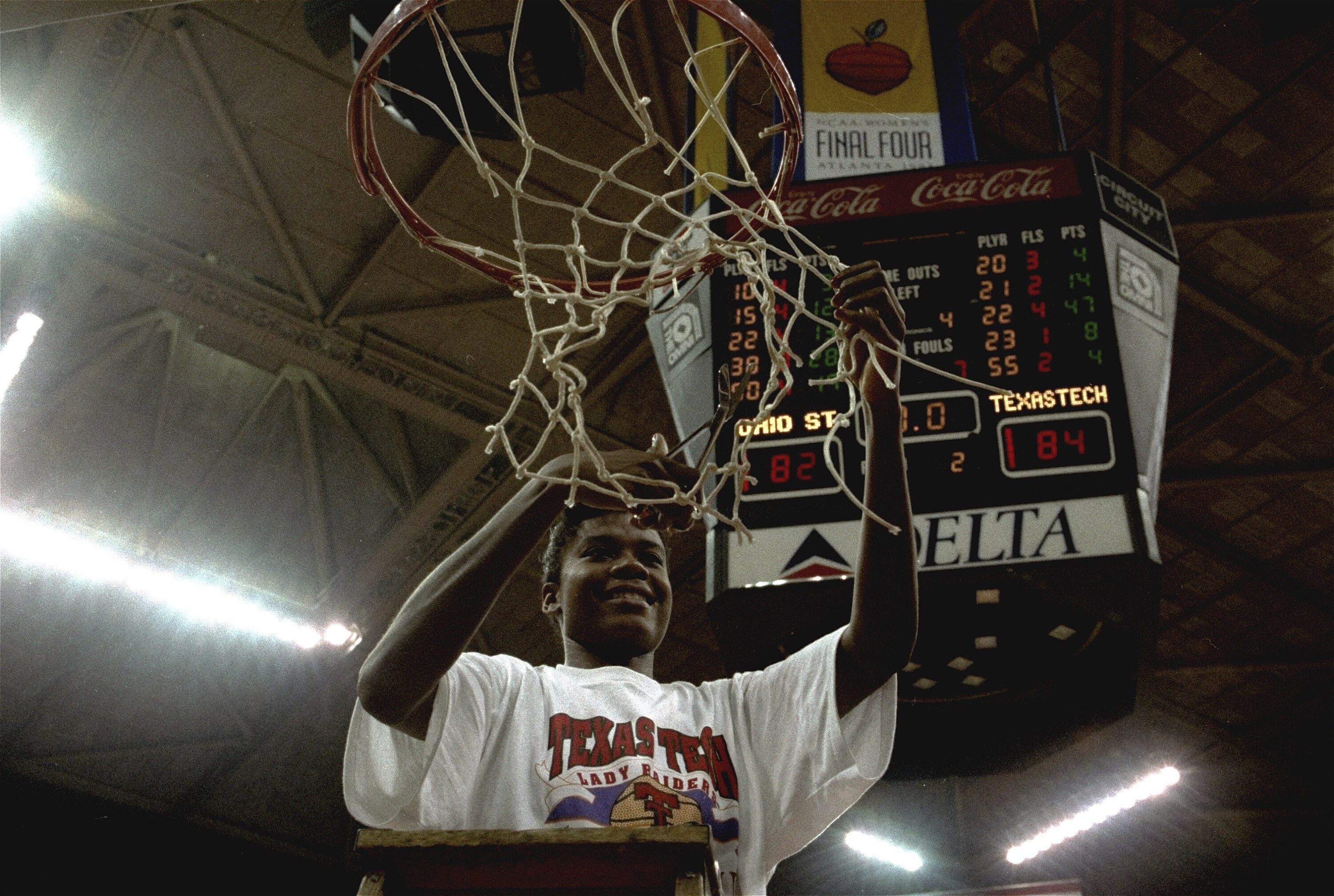 FILE - Sheryl Swoopes of Texas Tech cuts down the net after leading her team to victory over Ohio State, 84-82, in the NCAA Women's Division I basketball championship game April 4, 1993, in Atlanta, Ga. Swoopes scored 47 points and was named Tournament MVP.