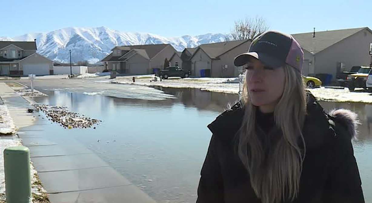 Amanda Mikesell talks to KSL Thursday, in Box Elder County. She says her street also filled with water from flooding in 2017.