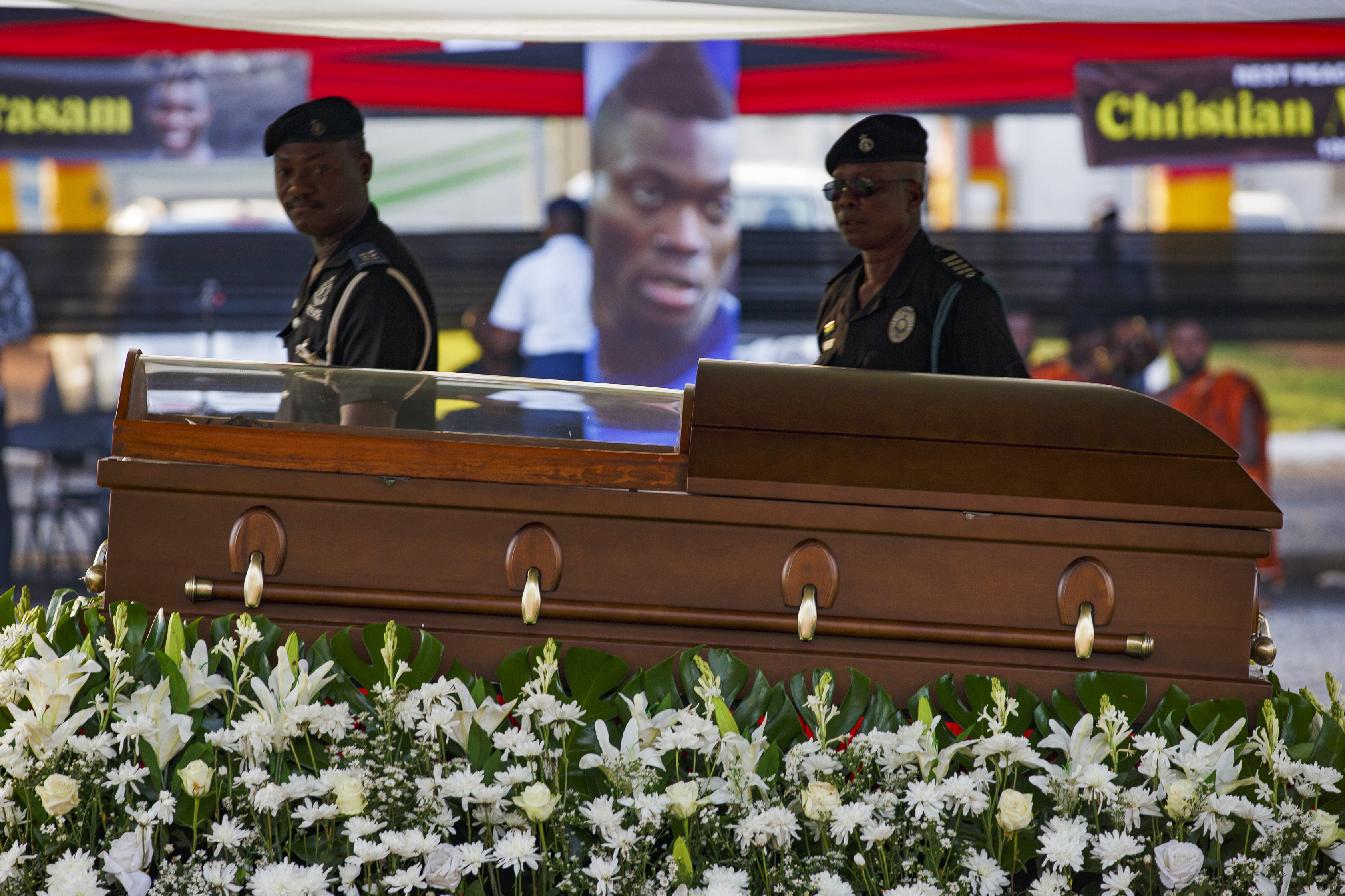 A military honour guard stands by the casket containing the remains of Ghana soccer player Christian Atsu during his funeral ceremony at the State House in Accra, Ghana, Friday, March 17, 2023. Atsu, who played for Premier League teams Chelsea and Newcastle, before joining Turkish club Hatayspor last year, was found dead in his collapsed apartment building in the Turkey earthquake. 