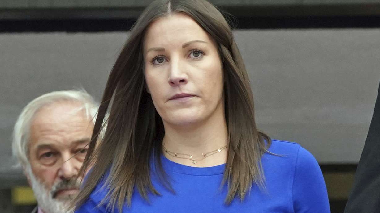 FILE - Mary Ellen Bettley-Smith leaves Birmingham Crown Court on Sept. 28, 2022 after she was acquitted on the charges of assaulting footballer Dalian Atkinson before his death in August 2016. Bettley-Smith was allowed to keep her job Friday March 17, 2023 after a disciplinary panel found her guilty of gross misconduct for unlawfully clubbing former professional soccer player Dalian Atkinson, who died after another officer used a stun gun and kicked him in the head.