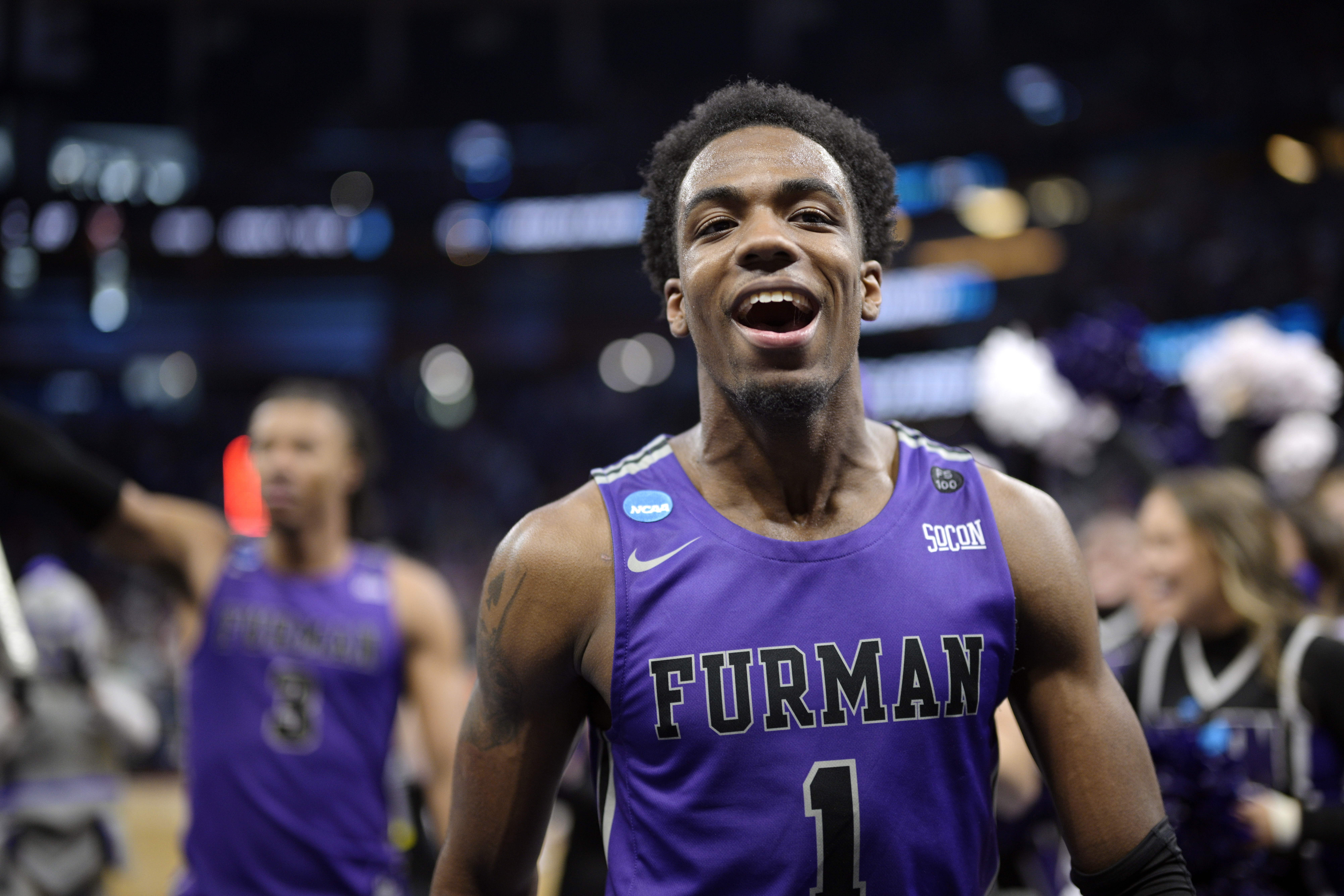 Furman guard JP Pegues (1) celebrates while leaving the court after their win against Virginia in a first-round college basketball game in the NCAA Tournament, Thursday, March 16, 2023, in Orlando, Fla. 