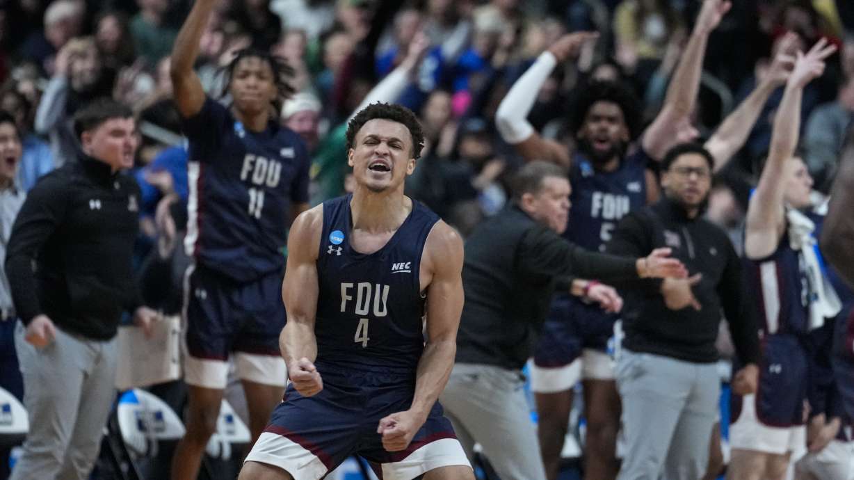 Fairleigh Dickinson guard Grant Singleton (4) celebrates after a basket against Purdue in the second half of a first-round college basketball game in the men's NCAA Tournament in Columbus, Ohio, Friday, March 17, 2023.