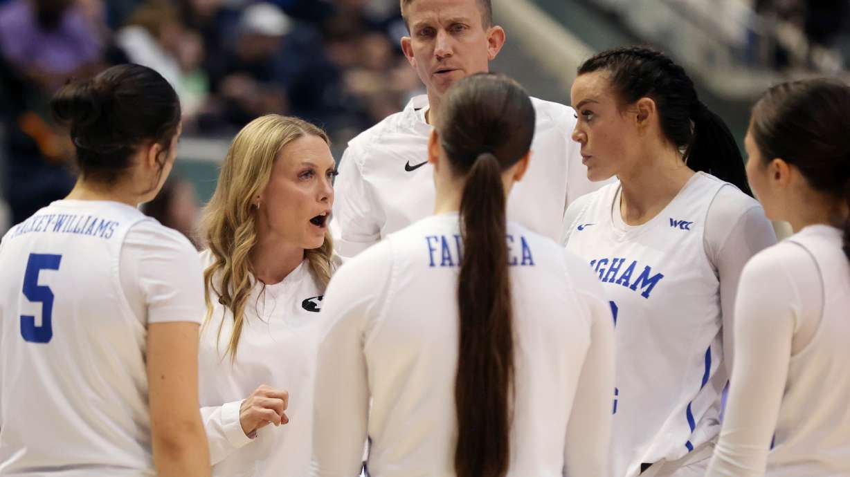 BYU women’s basketball head coach Amber Whiting talks to players during a timeout as the BYU Cougars play the Rice Owls in a Women’s National Invitation Tournament basketball game at the Marriott Center in Provo on Friday, March 17, 2023. BYU lost 71-67.