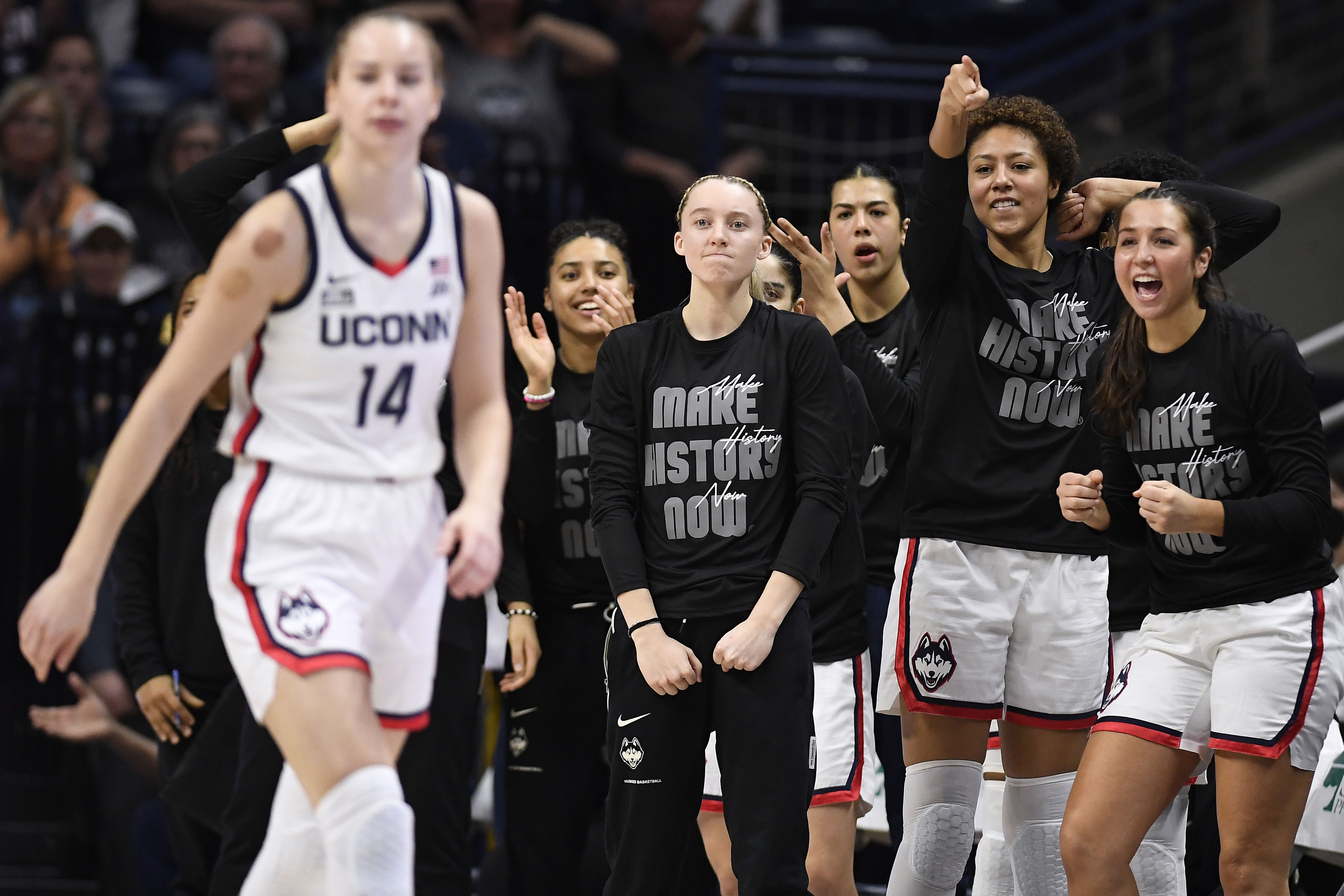 UConn's Azzi Fudd, Paige Bueckers, Jana El Alfy, Amari DeBerry and Caroline Ducharme, from left, react after Dorka Juhasz (14) blocked a Creighton shot during the first half of an NCAA college basketball game Wednesday, Feb. 15, 2023, in Storrs, Conn. 
