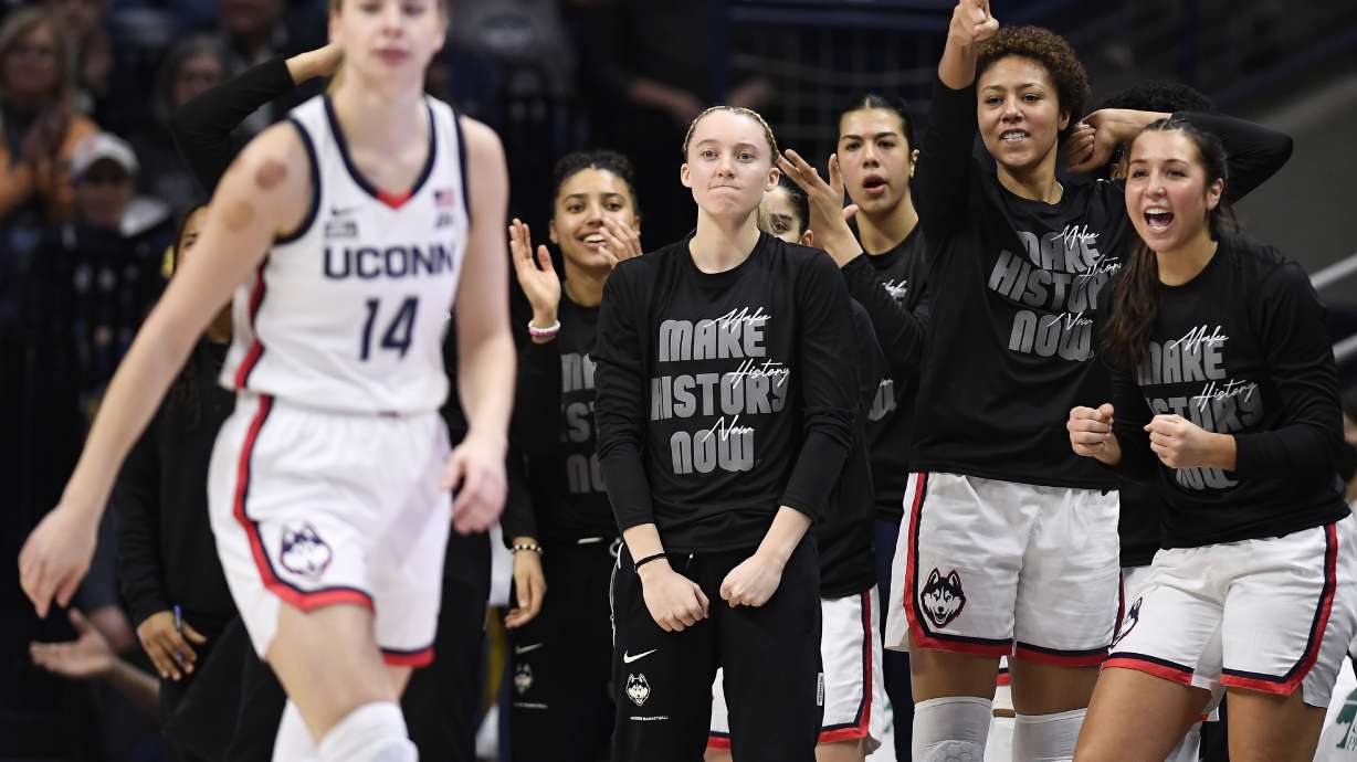 UConn's Azzi Fudd, Paige Bueckers, Jana El Alfy, Amari DeBerry and Caroline Ducharme, from left, react after Dorka Juhasz (14) blocked a Creighton shot during the first half of an NCAA college basketball game Wednesday, Feb. 15, 2023, in Storrs, Conn.