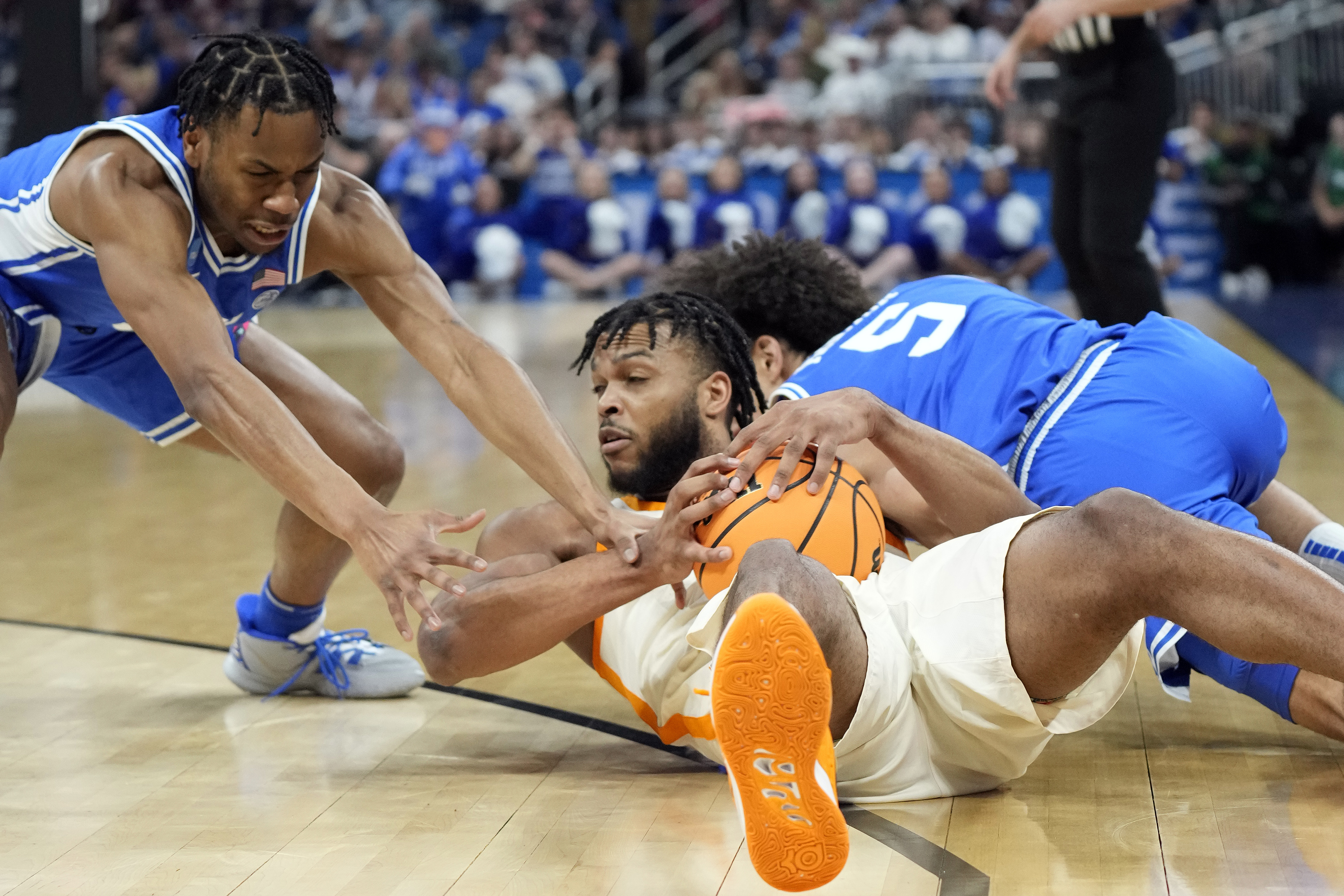 Tennessee guard Josiah-Jordan James (30) battles with Duke guard Jeremy Roach (3) for the ball during the first half of a second-round college basketball game in the NCAA Tournament Saturday, March 18, 2023, in Orlando, Fla. 