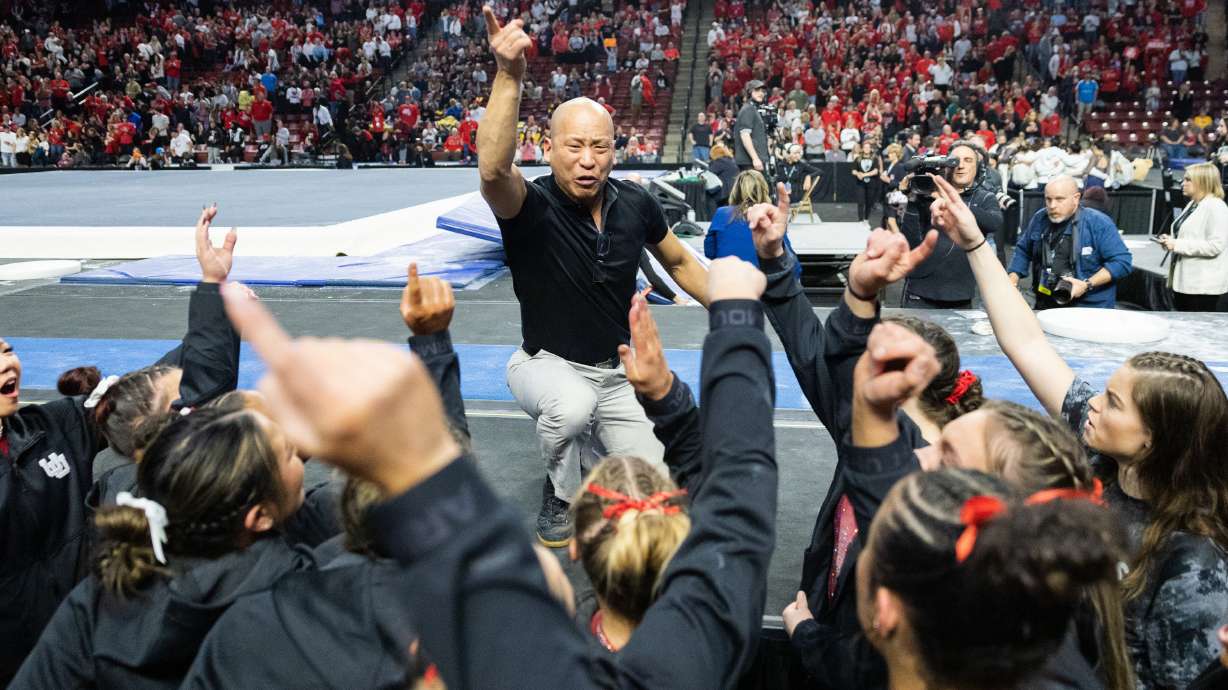 Utah’s head coach Tom Farden leads the team in a chant after winning the Pac-12 Gymnastics Championships at the Maverik Center in West Valley City on March 18, 2023.