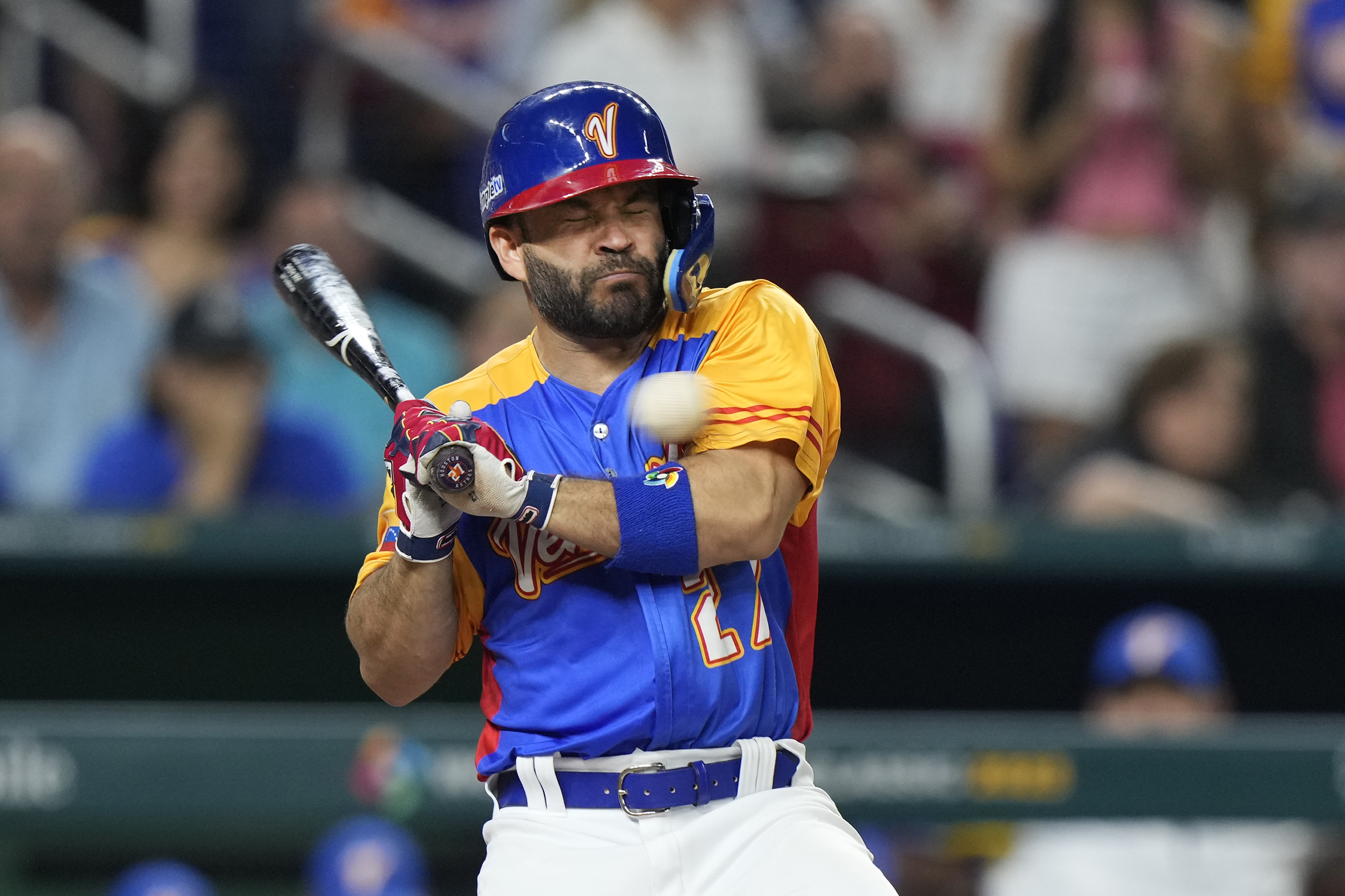 Venezuela's Jose Altuve is hit by a pitch during the fifth inning of a World Baseball Classic game against the U.S., Saturday, March 18, 2023, in Miami. 