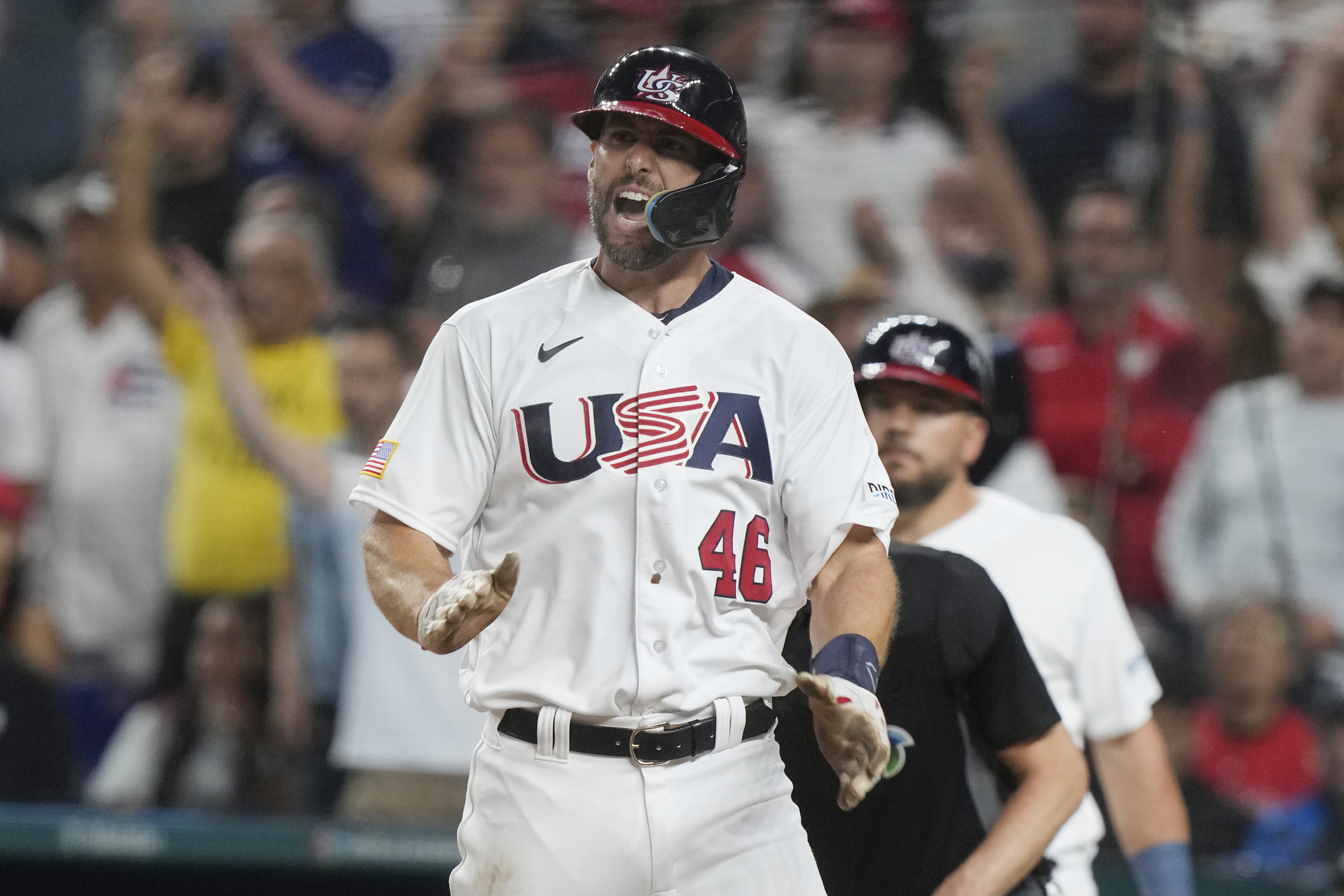 U.S. 's Paul Goldschmidt (46) gestures after scoring on a hit by Nolan Arenado during the fourth inning of a World Baseball Classic game against Cuba, Sunday, March 19, 2023, in Miami.