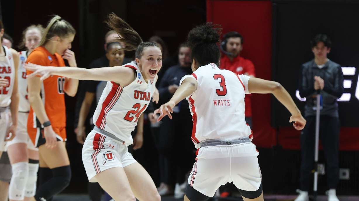 Utah Utes guard Kennady McQueen (24) and Utah Utes guard Lani White (3) celebrate the win over the Princeton Tigers in the second round of the NCAA tournament in Salt Lake City on Sunday, March 19, 2023. Utah won 63-56 and advance to the Sweet Sixteen.