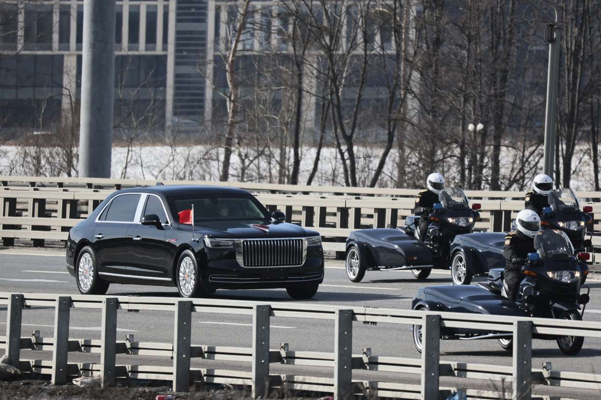 Chinese President Xi Jinping's motorcade drives from the Vnukovo-2 government airport outside Moscow, Russia, Monday.
