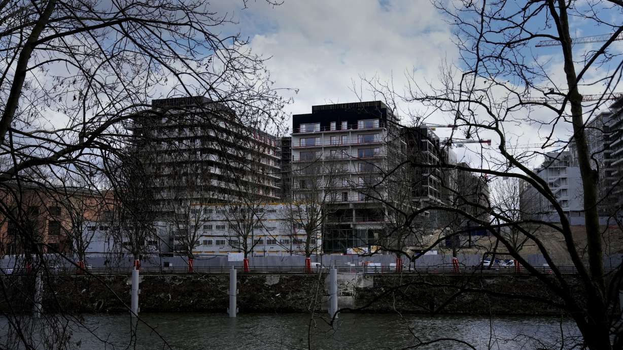 The Olympic athletes' village construction site is pictured In Saint Denis, outside Paris, Saturday, March 18, 2023. Some Paris 2024 Olympic hopefuls have expressed concern over the lack of air conditioning units in the athletes' village that will be home for thousands of athletes and sports officials during next year's Summer Games.