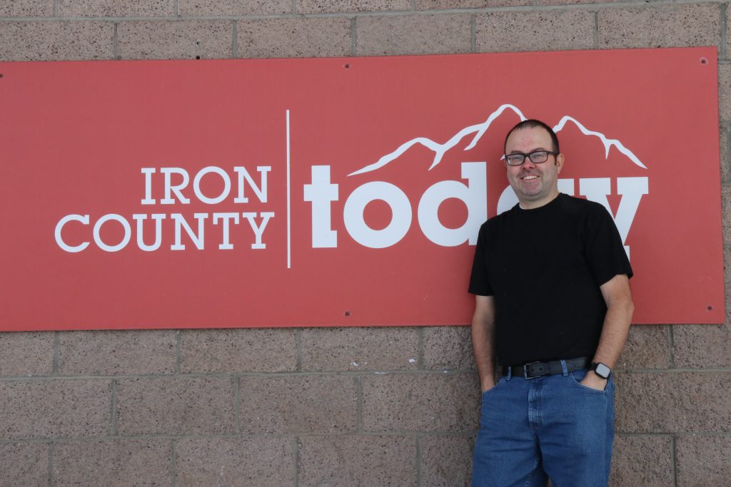 Iron County Today managing editor Corey Baumgartner in front of the newspaper's office in Cedar City, Feb. 15.