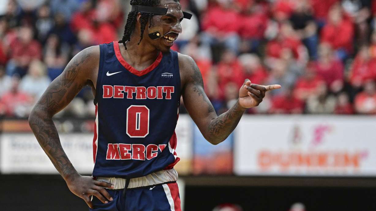 Detroit Mercy guard Antoine Davis smiles while talking with fans during the second half of an NCAA college basketball game against Youngstown State in the quarterfinals of the Horizon League tournament Thursday, March 2, 2023, in Youngstown, Ohio.