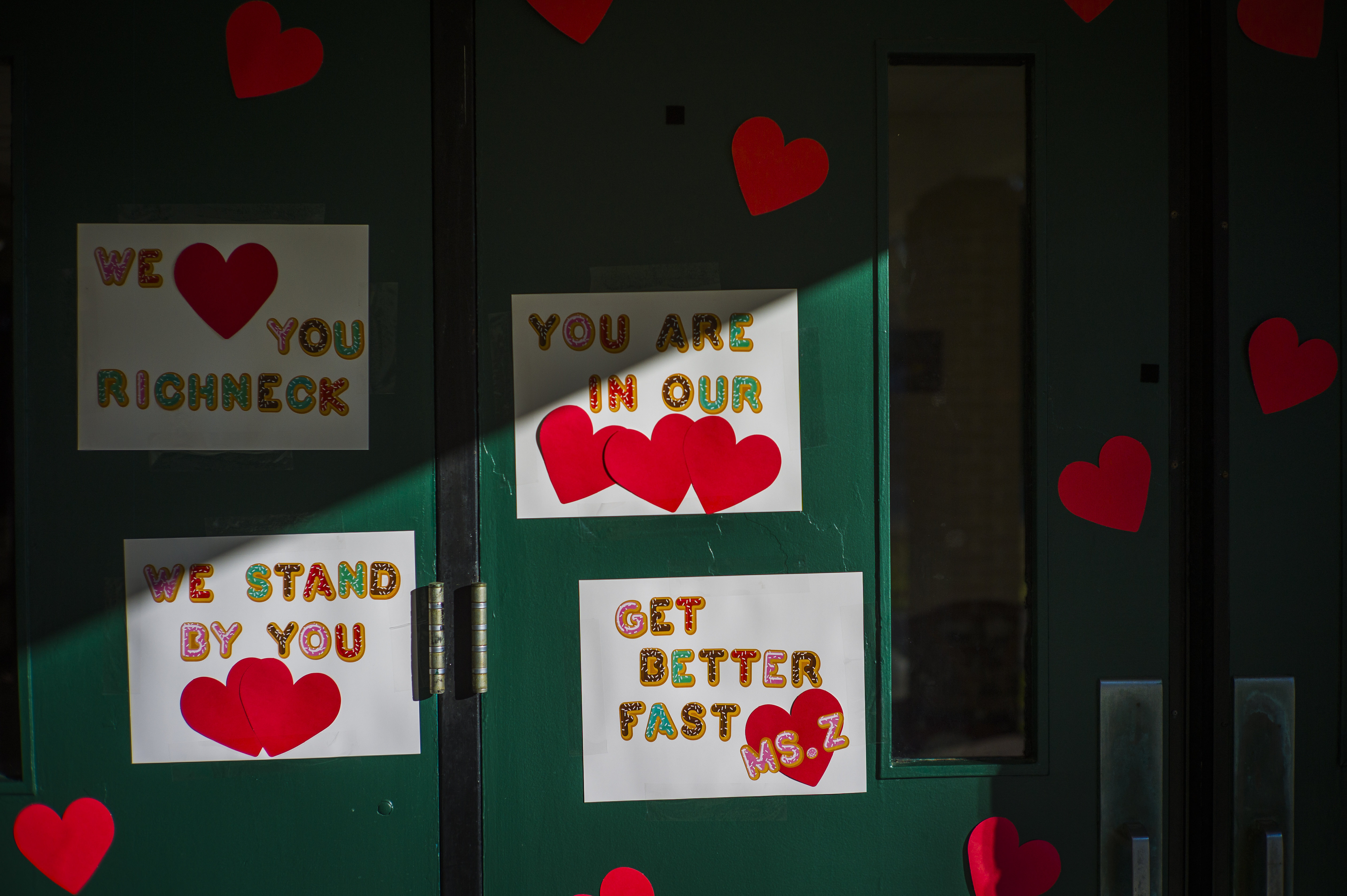 Messages of support for teacher Abby Zwerner, who was shot by a 6-year-old student, grace the front door of Richneck Elementary School Newport News, Va. on Jan. 9. Zwerner said Monday that she has had four surgeries and has gone through a challenging recovery.