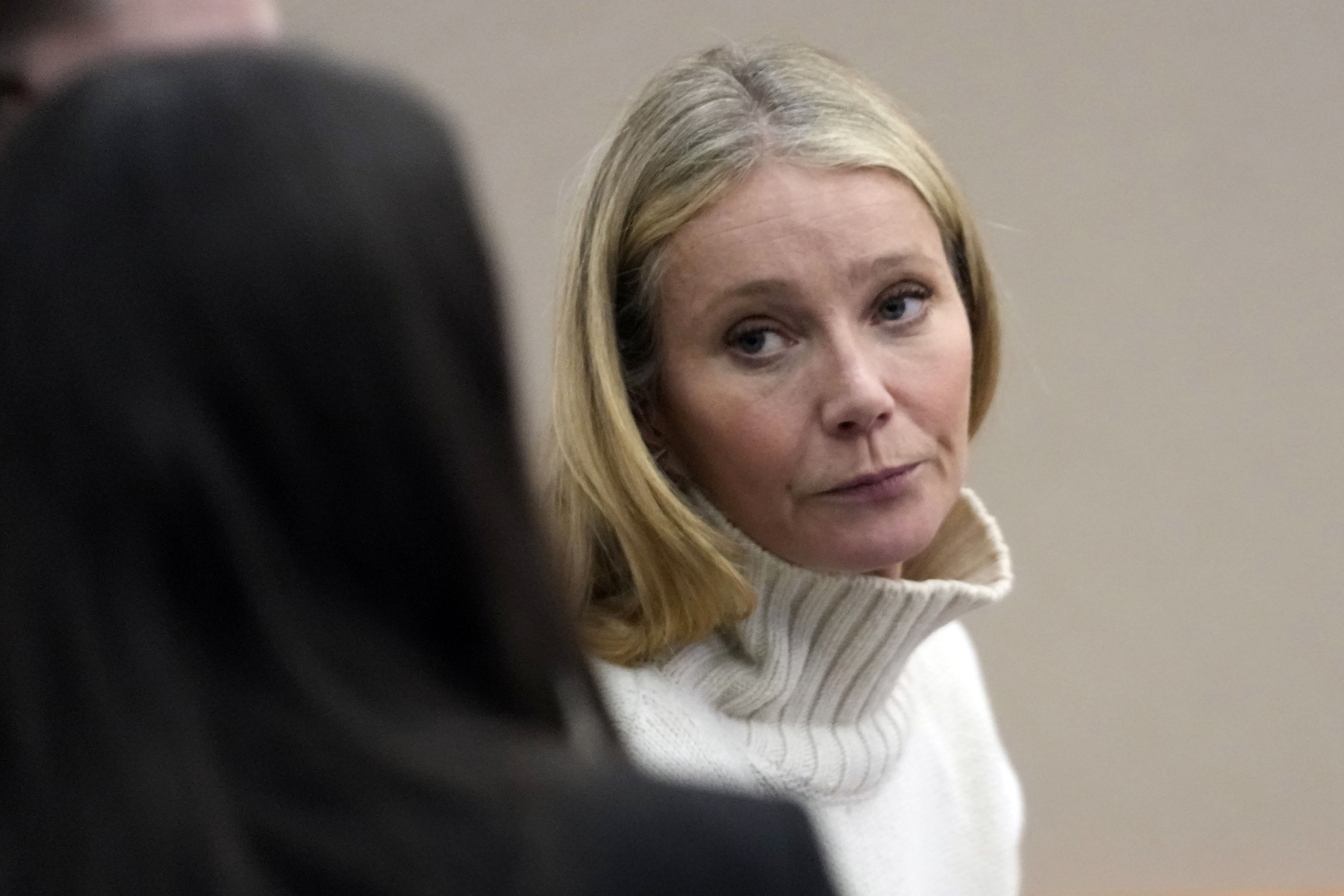 Actor Gwyneth Paltrow looks on before leaving the Park City courtroom Tuesday, where she is accused in a lawsuit of crashing into a skier during a 2016 family ski vacation, leaving him with brain damage and four broken ribs.