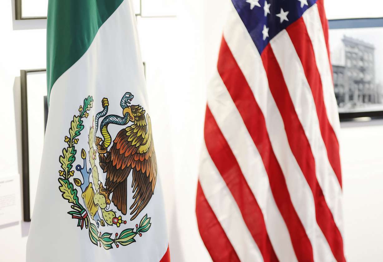 Mexican and U.S. flags on display at the Mexican Consulate in Salt Lake City on Wednesday, Dec. 21, 2022.