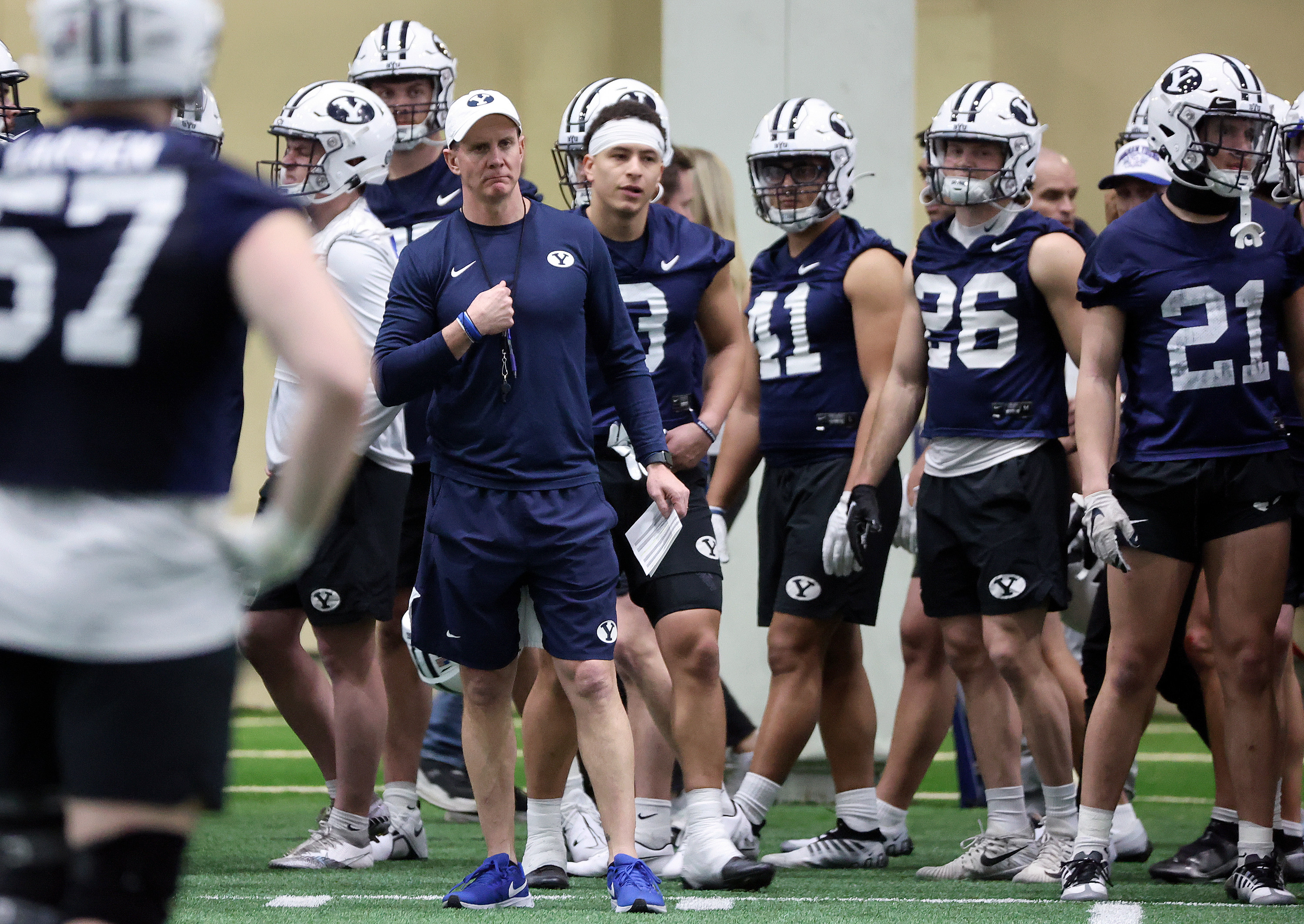 Jay Hill, BYU associate head coach, defensive coordinator and safeties coach, watches players practice during opening day of BYU spring football camp at the BYU Indoor Practice Facility in Provo, on Monday, March 6, 2023.