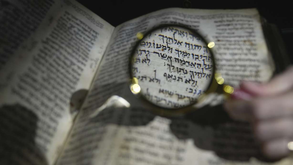 The Hebrew Bible "Codex Sassoon," that dates back more than 1,000 years, is on display during a media preview of Sotheby's auction, in London, Feb. 22. The piece has an estimated price of $30-50 million and will go on auction on May in New York.