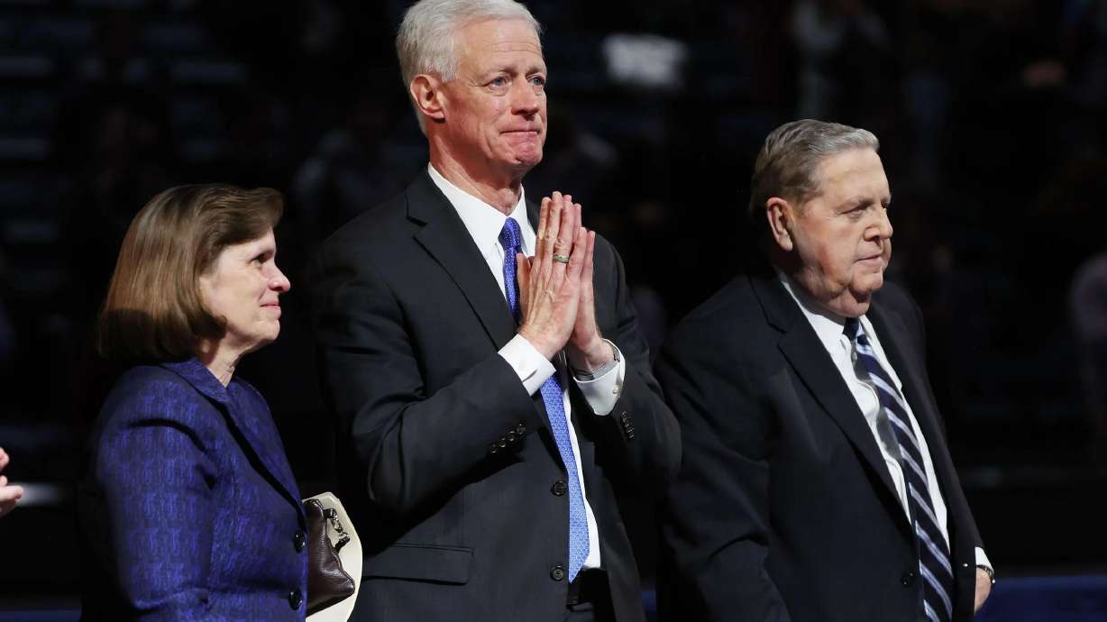 BYU President Kevin J Worthen is emotional as he is released from his position by Elder Jeffrey R. Holland of The Church of Jesus Christ of Latter-day Saints during a BYU devotional at the Marriott Center in Provo on Tuesday.