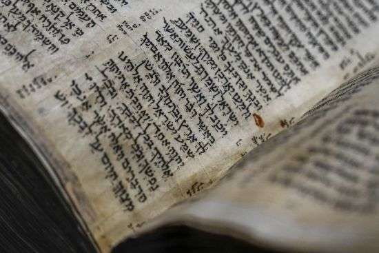 The Codex Sassoon 1,100-year-old Hebrew Bible is on display at the Tel Aviv's ANU Museum of the Jewish People for a week-long exhibition of the manuscript, part of a whirlwind worldwide tour of the artifact in the United Kingdom, Israel and the United States before its expected sale, Israel, March 22.