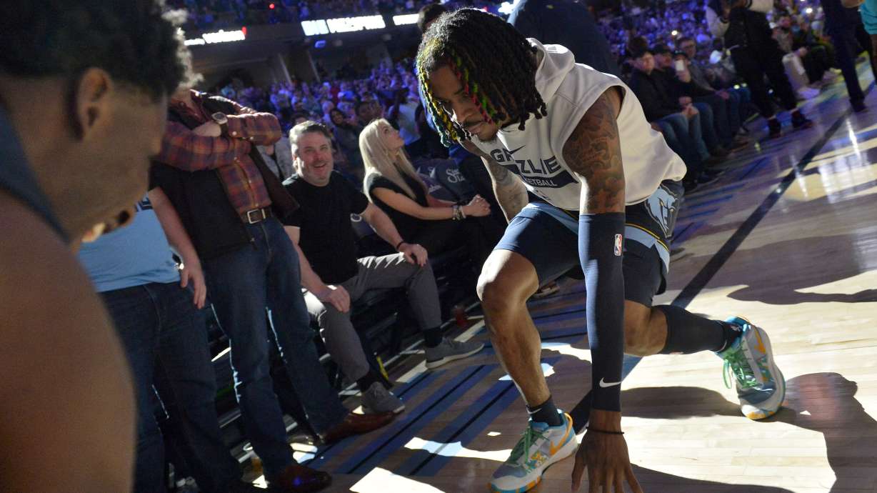 Memphis Grizzlies guard Ja Morant and forward Jaren Jackson Jr., left, warm up before and an NBA basketball game against the Houston Rockets Wednesday, March 22, 2023, in Memphis, Tenn.