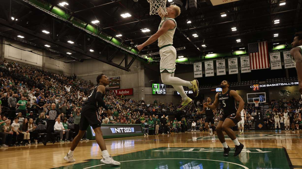 Utah Valley guard Trey Woodbury throws down a dunk during a 74-68 win over Cincinnati in an NIT quarterfinal in front of 5,289 fans at the UCCU Center, Wednesday March 22, 2023 in Orem.