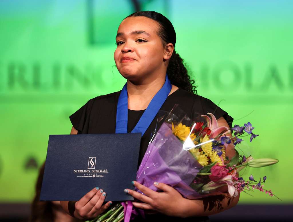 Nevaeh Parker of Roy High School receives the Speech/Theatre Arts/Forensics award during the 2023 Sterling Scholar awards ceremony in North Salt Lake on Wednesday.