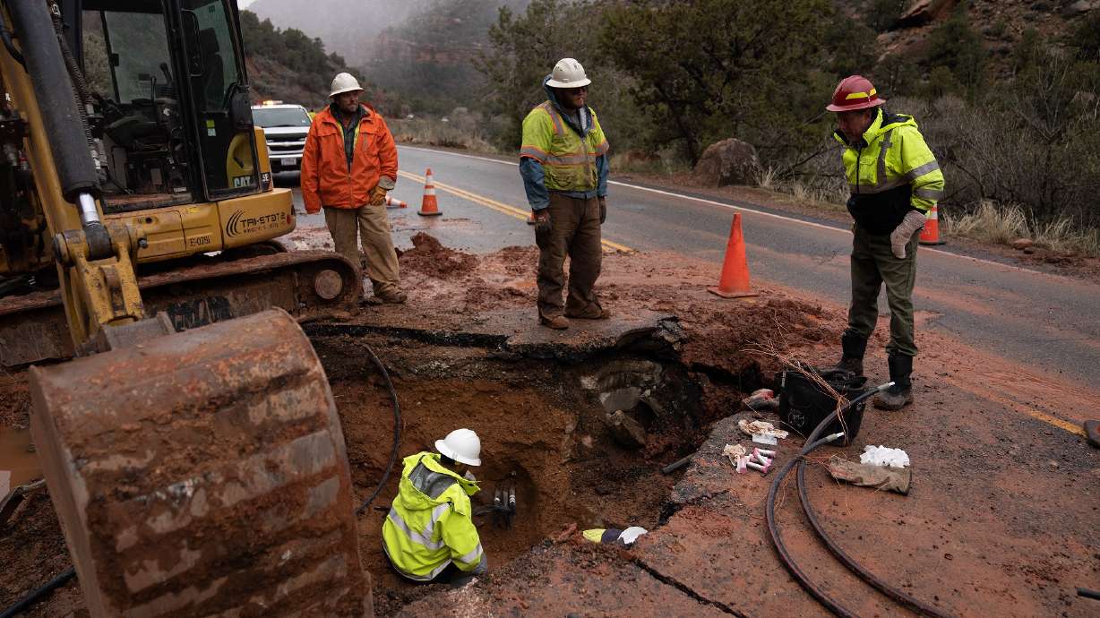 Maintenance workers and engineers work to assess and repair Zion Canyon Scenic Drive following large rockfall in the area on Tuesday. The road is currently open but Kolob Canyons Road is currently closed.