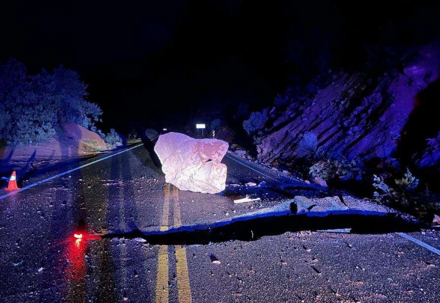 A boulder causes damage to Zion Canyon Scenic Drive after a rockfall late Tuesday. The road is currently open after repairs.
