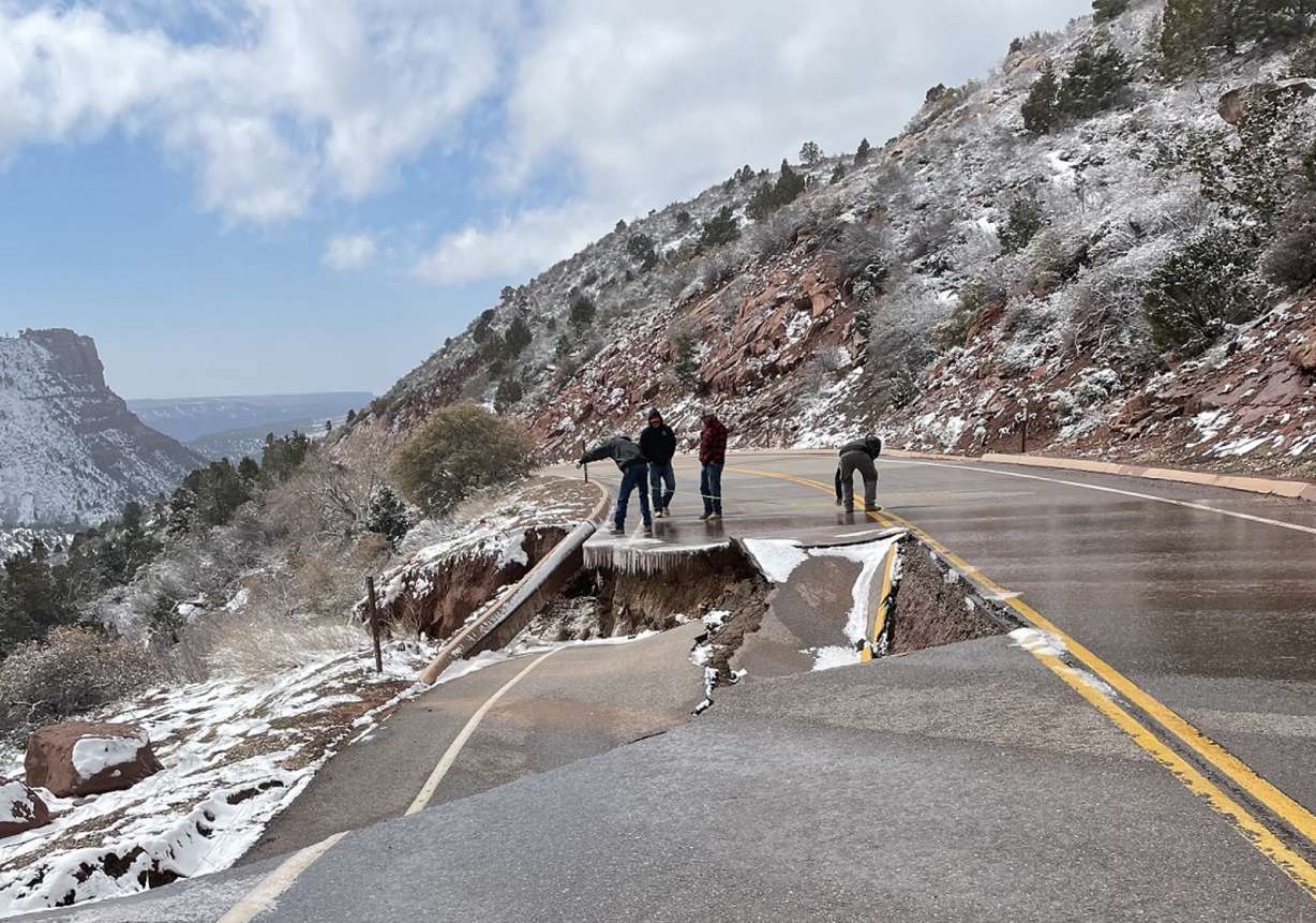 Engineers and maintenance staff measure road damage on Kolob Canyons Road. The road is currently closed because of damage, park officials said Thursday.