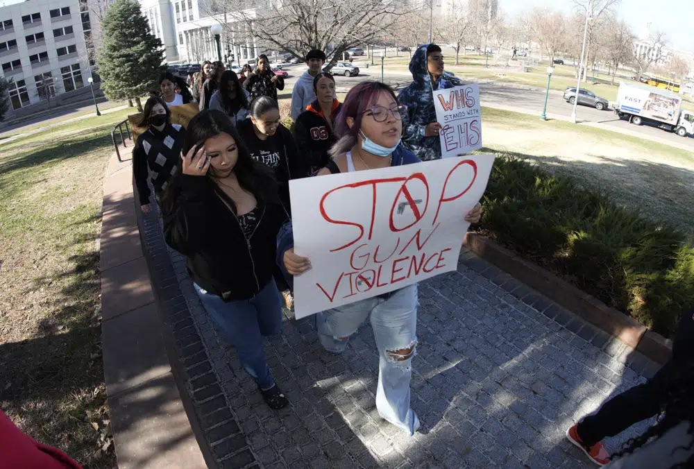 Students from Denver's West High School join forces with East High School students to call for gun control measures to be considered by state lawmakers Thursday during a rally outside the State Capitol in Denver. A shooting left two administrators injured at East High School on Wednesday, one of a series of gun-related events at the school in the past six weeks.