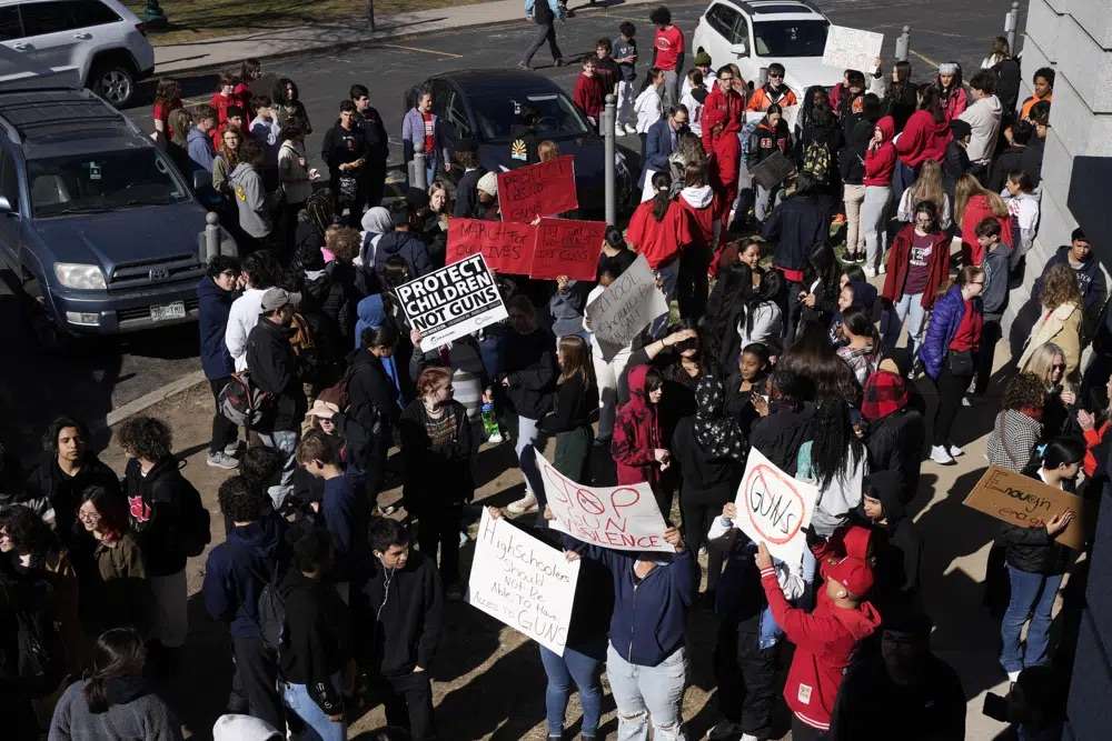 Students from East High School and West High School enter the State Capitol to call for gun control measures to be considered by state lawmakers Thursday during a rally in Denver. A shooting left two administrators injured at East High School on Wednesday, one of a series of gun-related events at the school in the past six weeks.