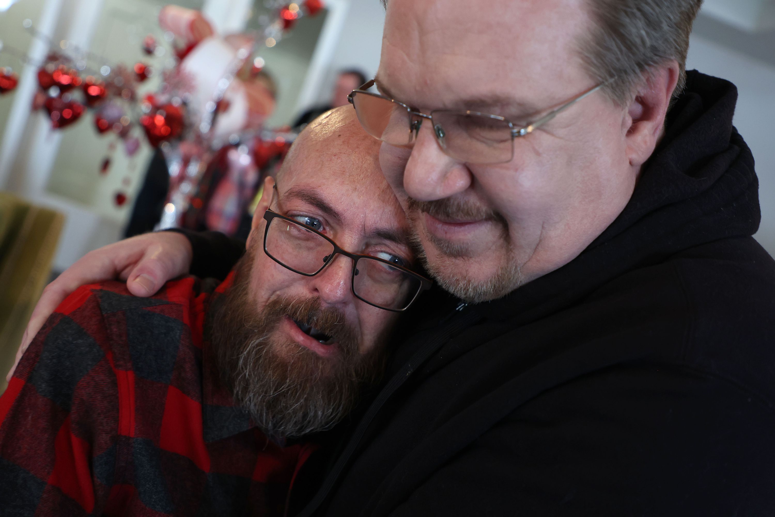 Todd Curtis, copy chief at the Deseret News, embraces Brian West, news director at KSL.com and former news director at the Deseret News, during a reception marking the end of Curtis’ tenure at the newspaper in Sandy on Feb. 11. From kind acts to clean copy, Curtis taught us all just how much the little things matter.