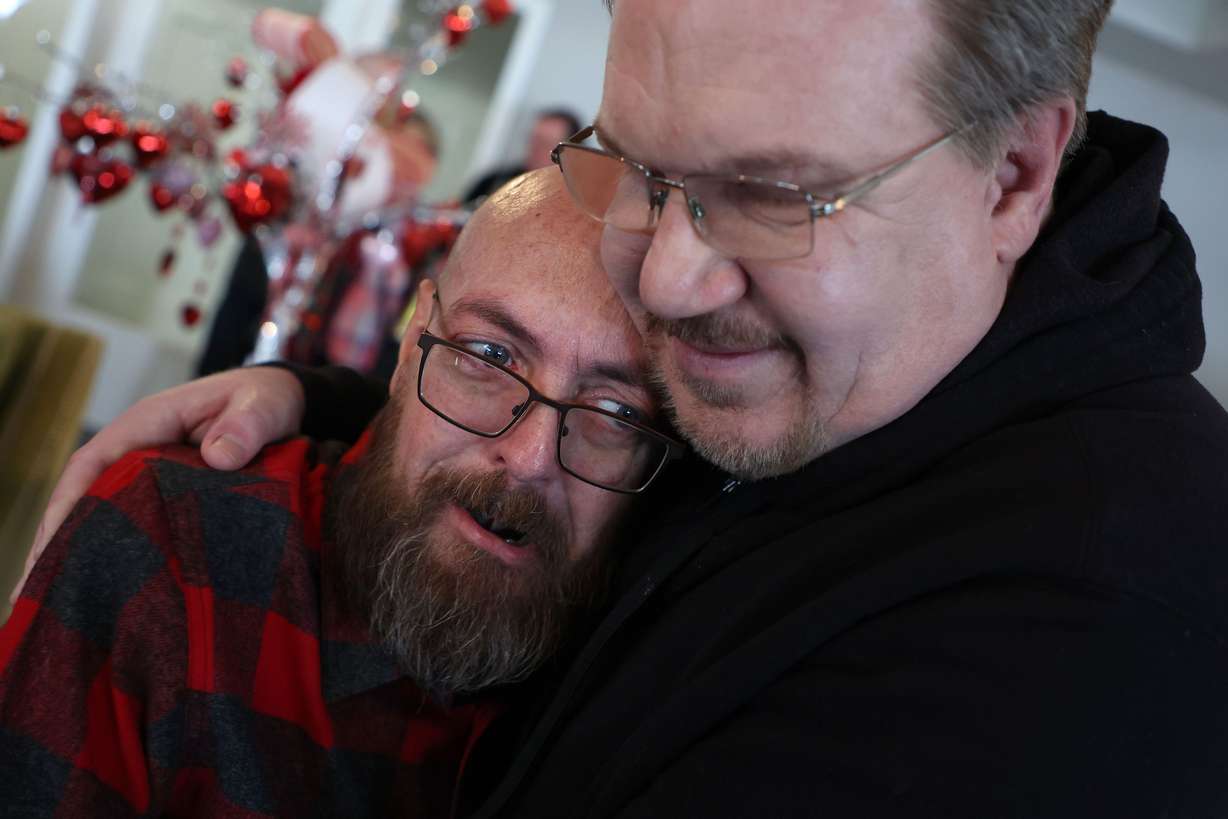 Todd Curtis, copy chief at the Deseret News, embraces Brian West, news director at KSL.com and former news director at the Deseret News, during a reception marking the end of Curtis’ tenure at the newspaper in Sandy on Feb. 11. From kind acts to clean copy, Curtis taught us all just how much the little things matter.