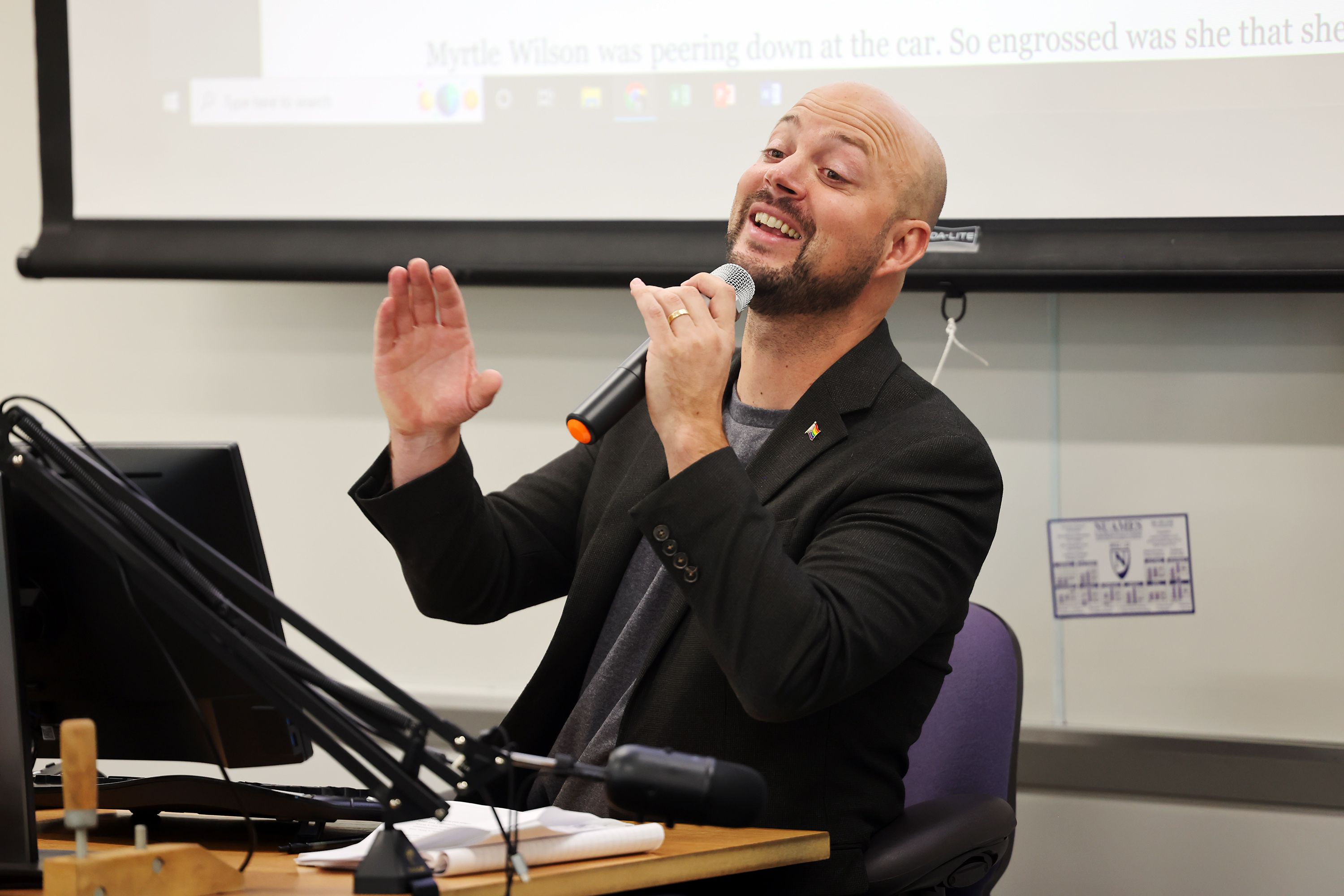 Blake Bockholt, a high school teacher at NUAMES High School at the Weber State Layton campus, talks with his students on Oct. 4, 2022. Bockholt suffers from long COVID-19.