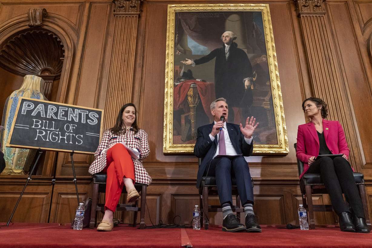 Speaker of the House Kevin McCarthy, center, with Rep. Elise Stefanik, R-N.Y., left, and Rep. Julia Letlow, R-La., speaks about proposed legislation dubbed the "Parents Bill of Rights," March 1, on Capitol Hill in Washington.