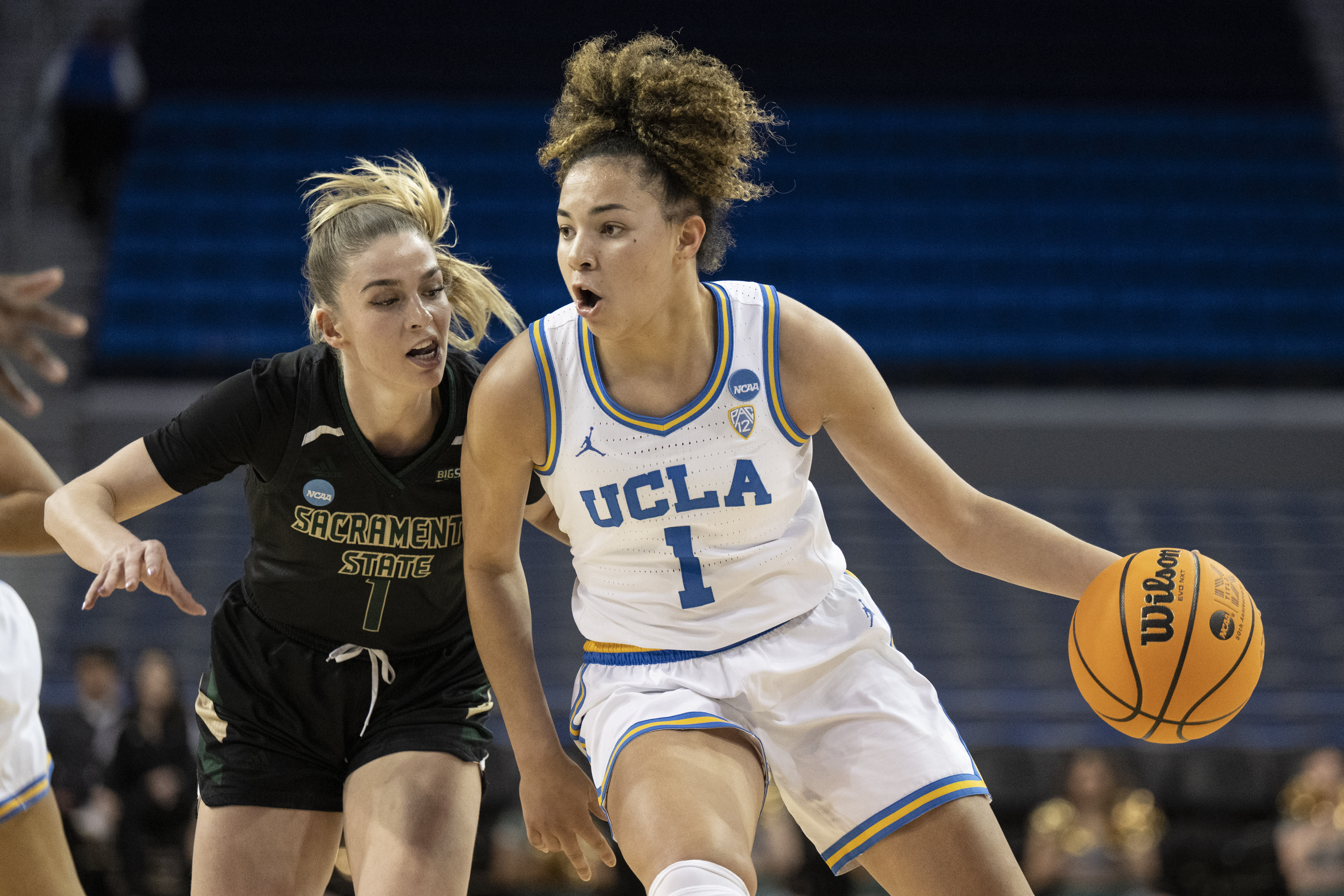 UCLA guard Kiki Rice, right, drives as Sacramento State guard Benthe Versteeg defends during the second half of a first-round college basketball game in the women's NCAA Tournament, Saturday, March 18, 2023, in Los Angeles.